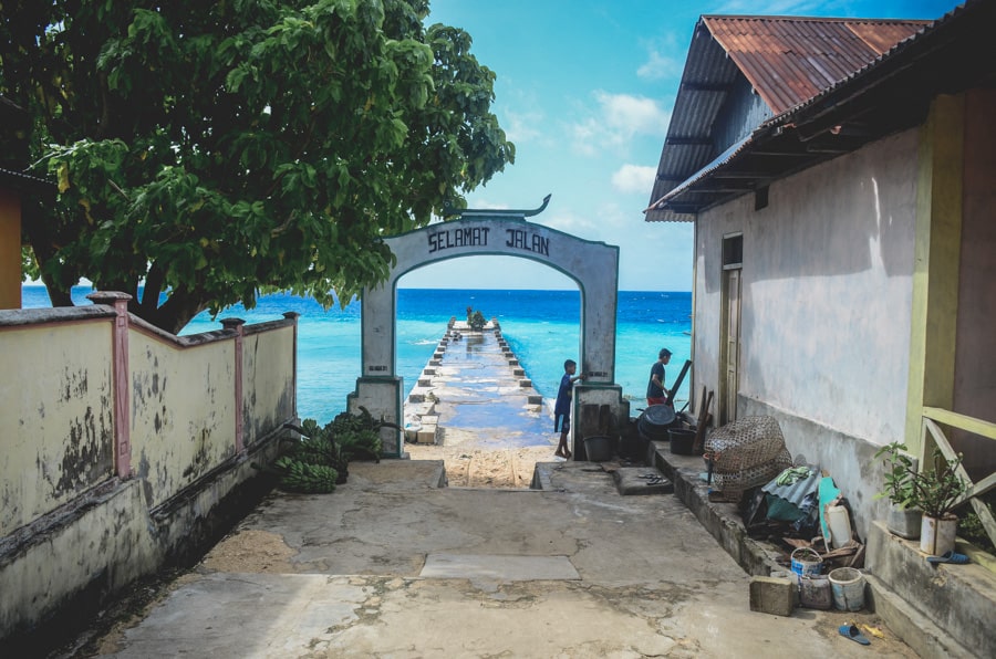 The jetty at Pulau Ai with stunning blue water
