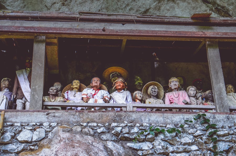 Tau tau effigies in a cliff at Lemo in Tana Toraja, Sulawesi