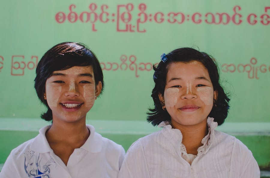 Girls wearing traditional makeup at U Min Thonze in Sagaing near Mandaly