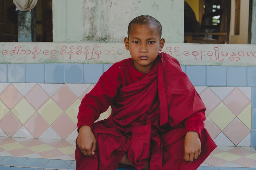 Novice monk outside the U Min Thonze in Sagaing near Mandalay in Myanmar