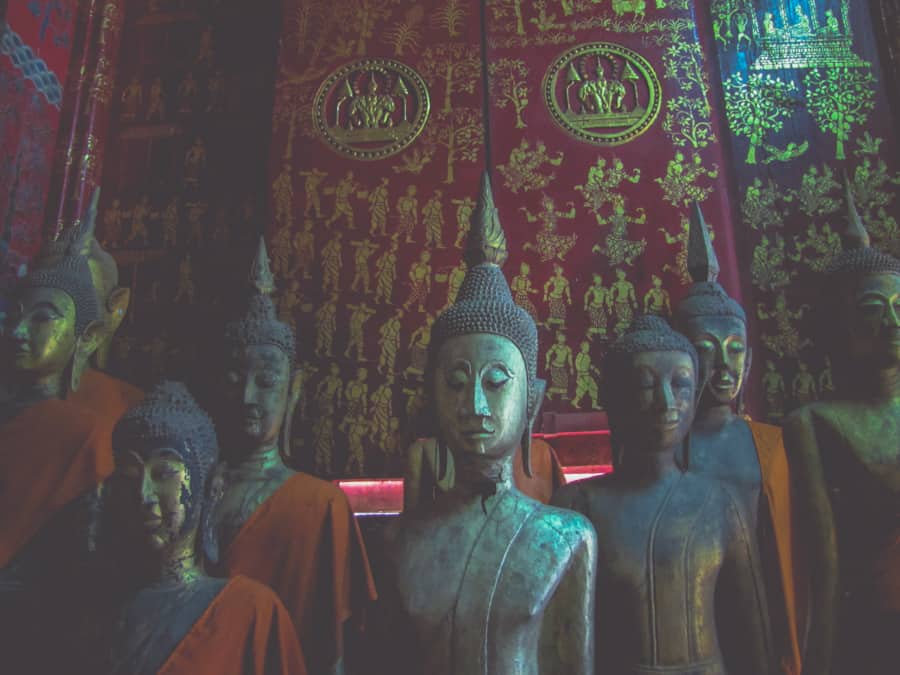 Laos travel photography: Buddhas and mural paintings in South East Asia seen in Laos