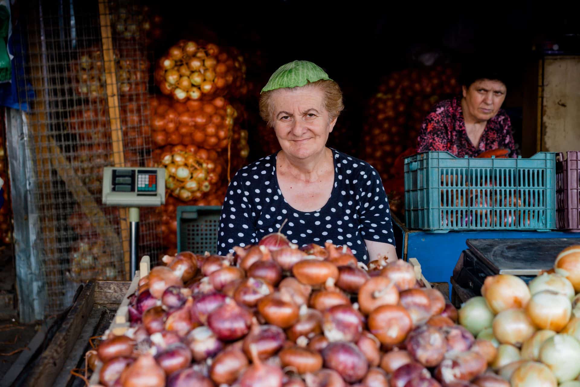 Woman selling vegetables at the  Dezerter Bazar in Tbilisi