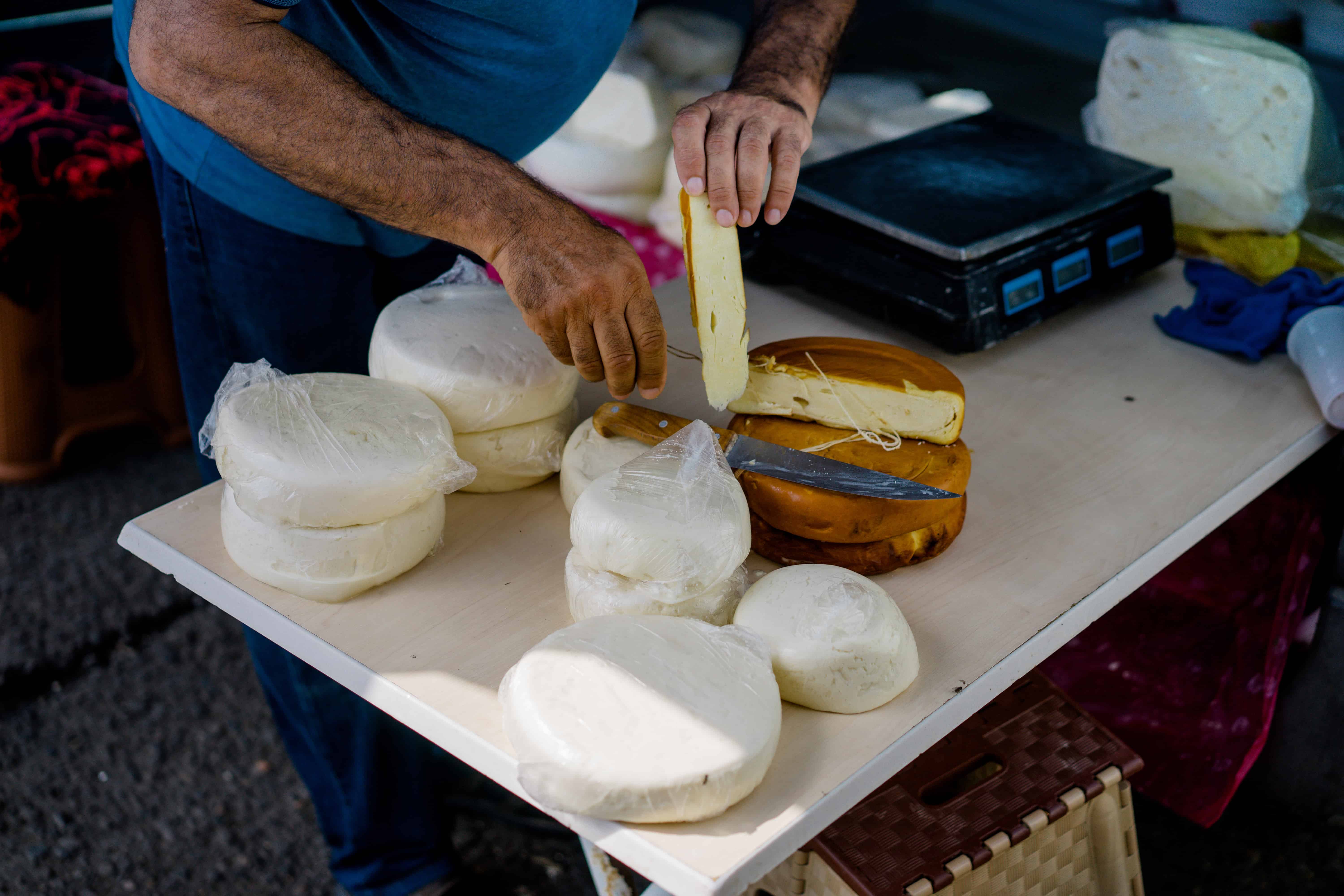 Buying cheese at the Dezerter market in Tbilisi