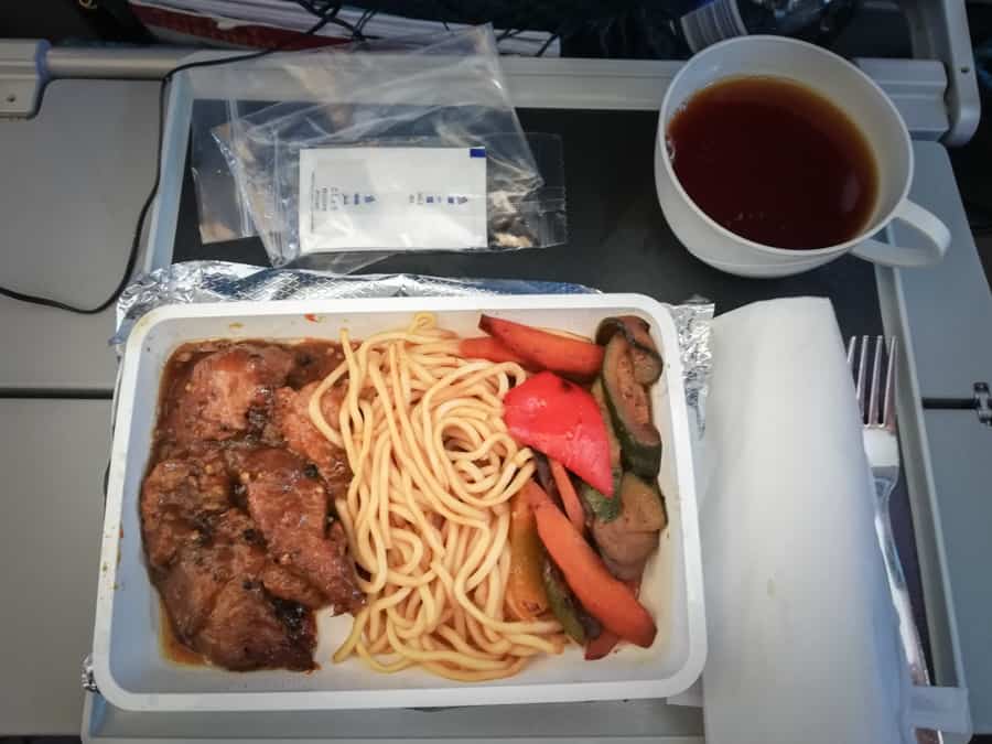 Breakfast on SQ from Cape Town to Johannesburg: stir fried pork and noodles with vegetables
