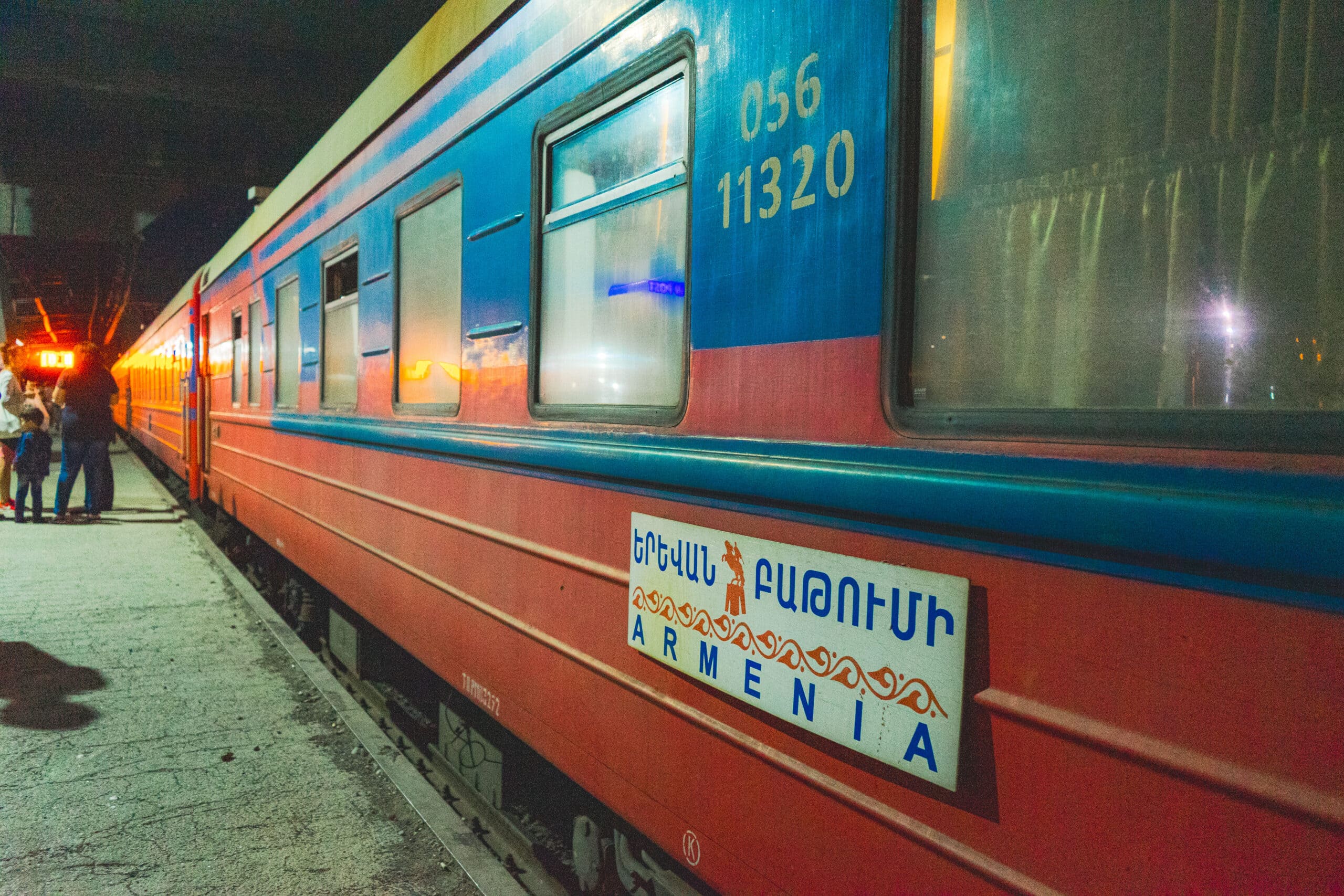The old red and blue Armenia branded nigh train at Tbilisi station