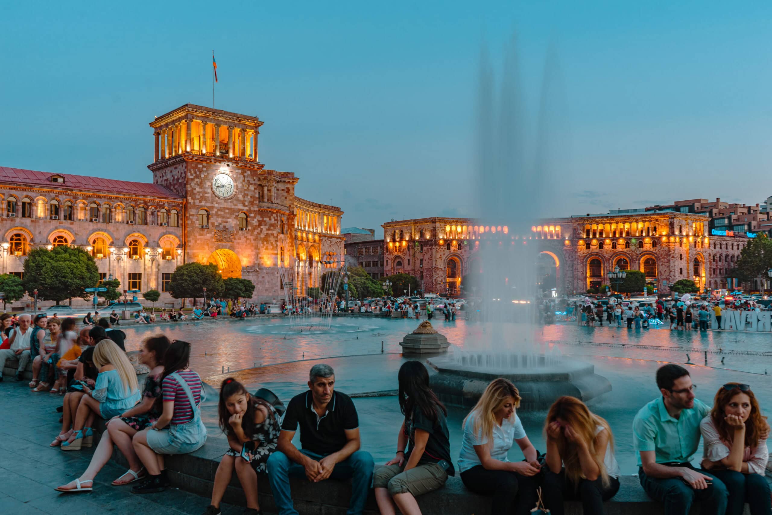 People gather around the Singing Fountains in Yerevan in the early evening