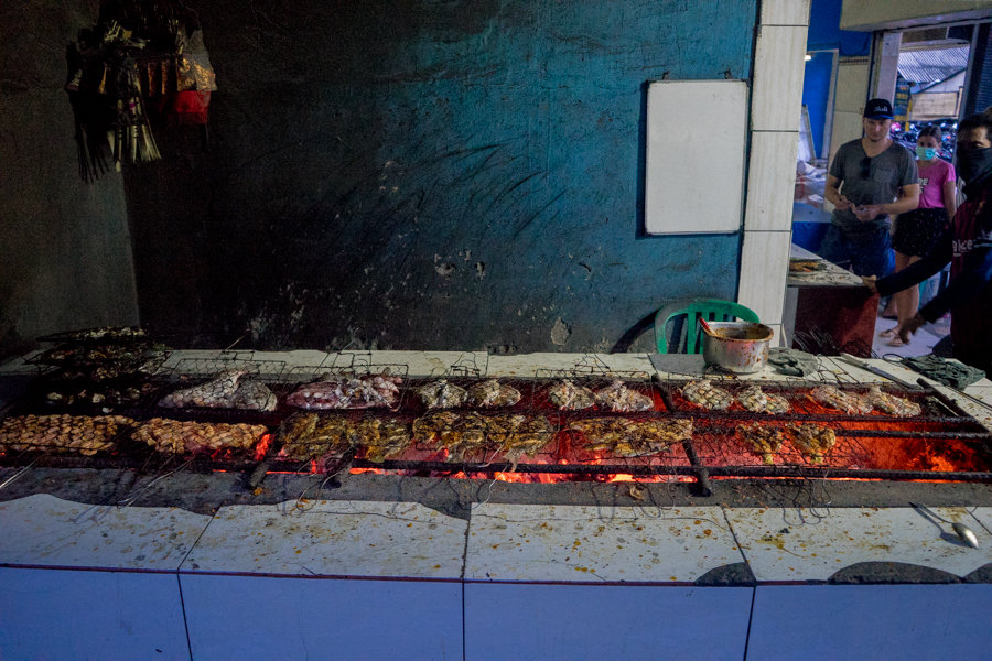 Warung grilling fish at Jimbaran fish market, Bali