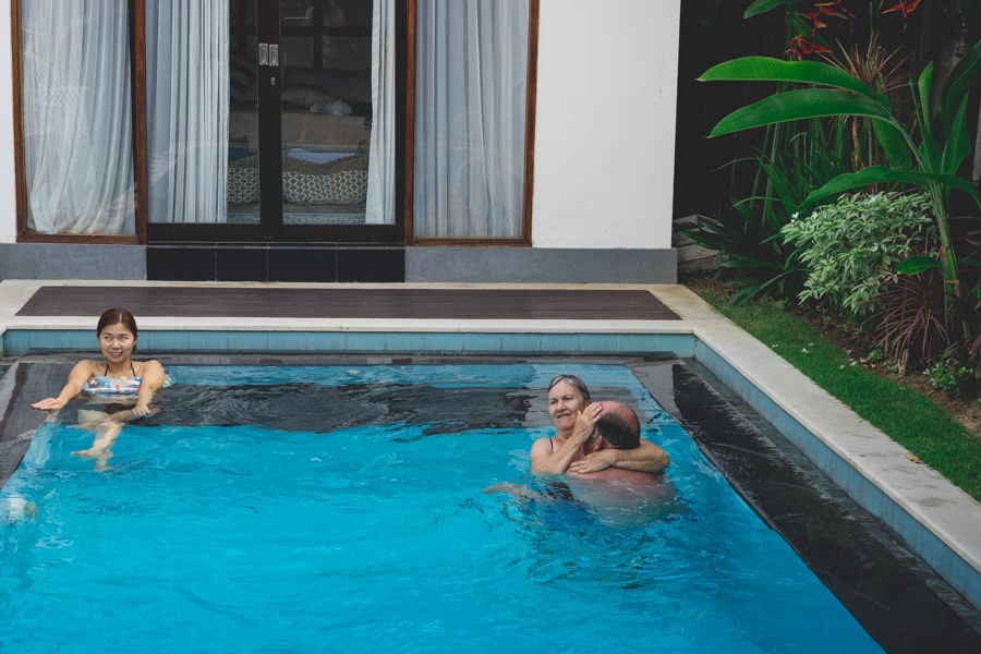 Family enjoying the pool at our private villa in Bali