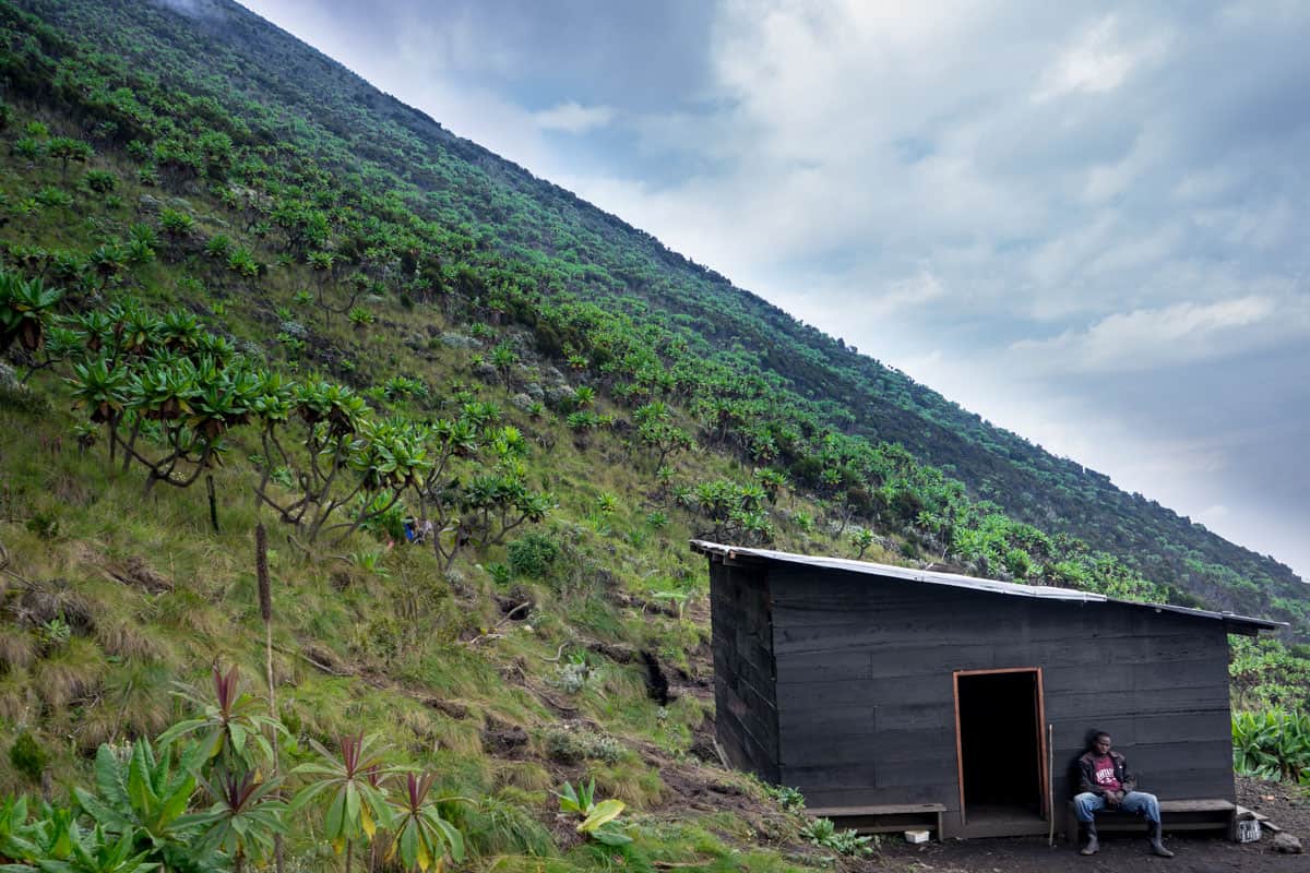 Porter taking a rest up Mount Nyiragongo, DRC