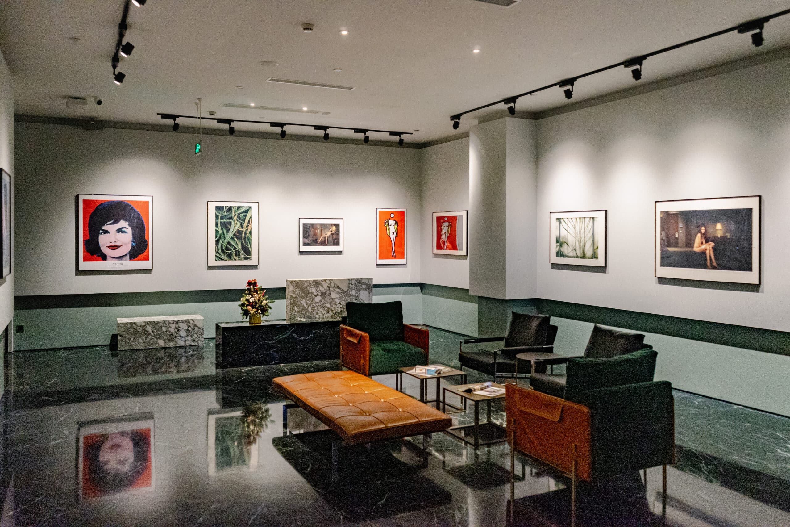 The lobby of the Sfeel Designer Hotel in Chengdu where we stayed. It looks almost like an art gallery with modern art hanging on the walls, leather couches and dark marble and granite flooring