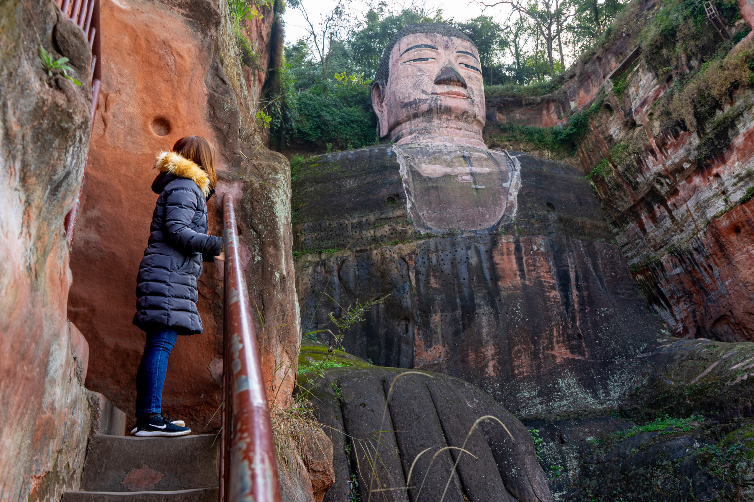 Jin looks at the Leshan Giant Buddha. It's the most popular Chengdu attraction for a day trip
