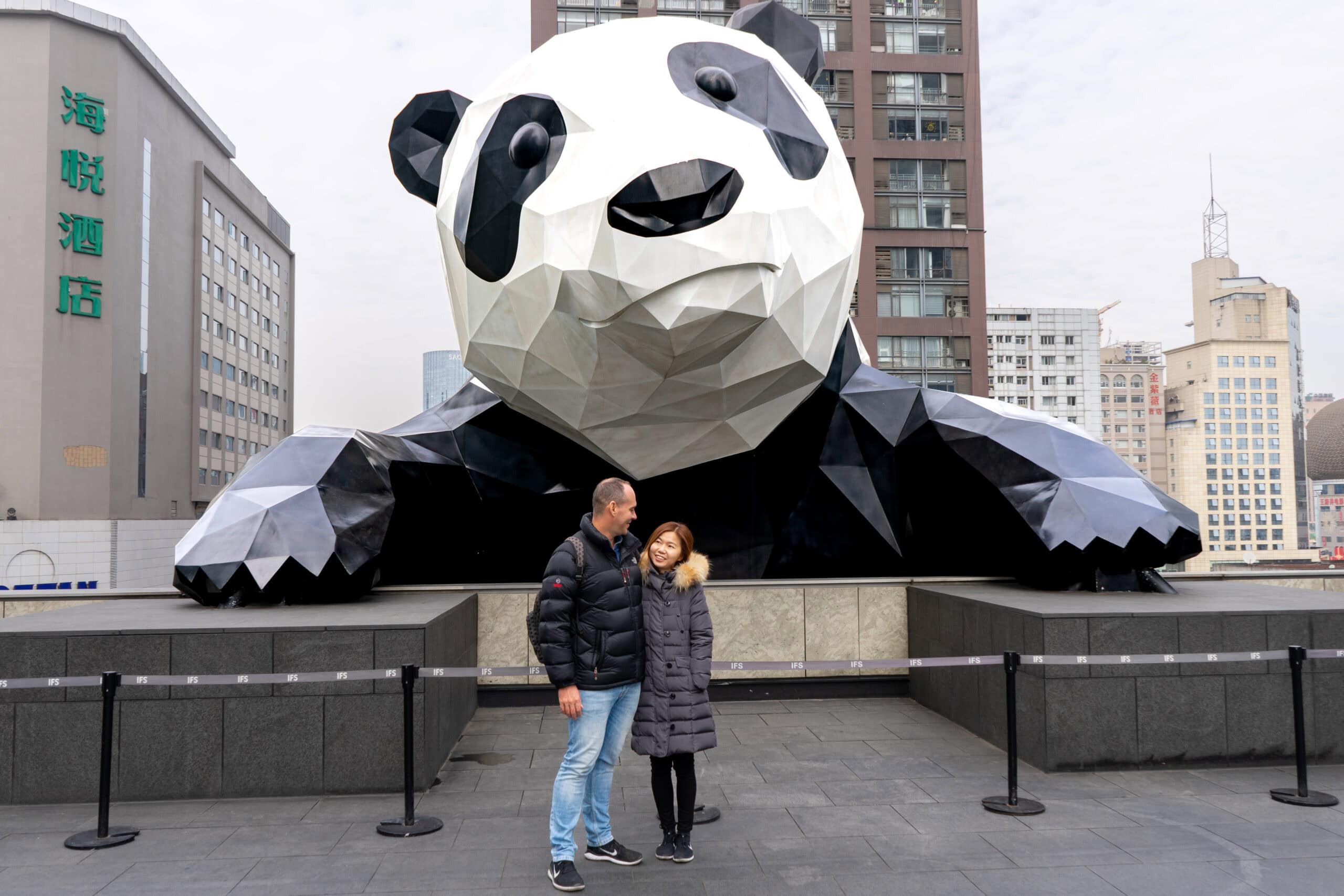 Jin and I pose for a couple photo in front of the panda on the roof top of the IFS mall in Chengdu