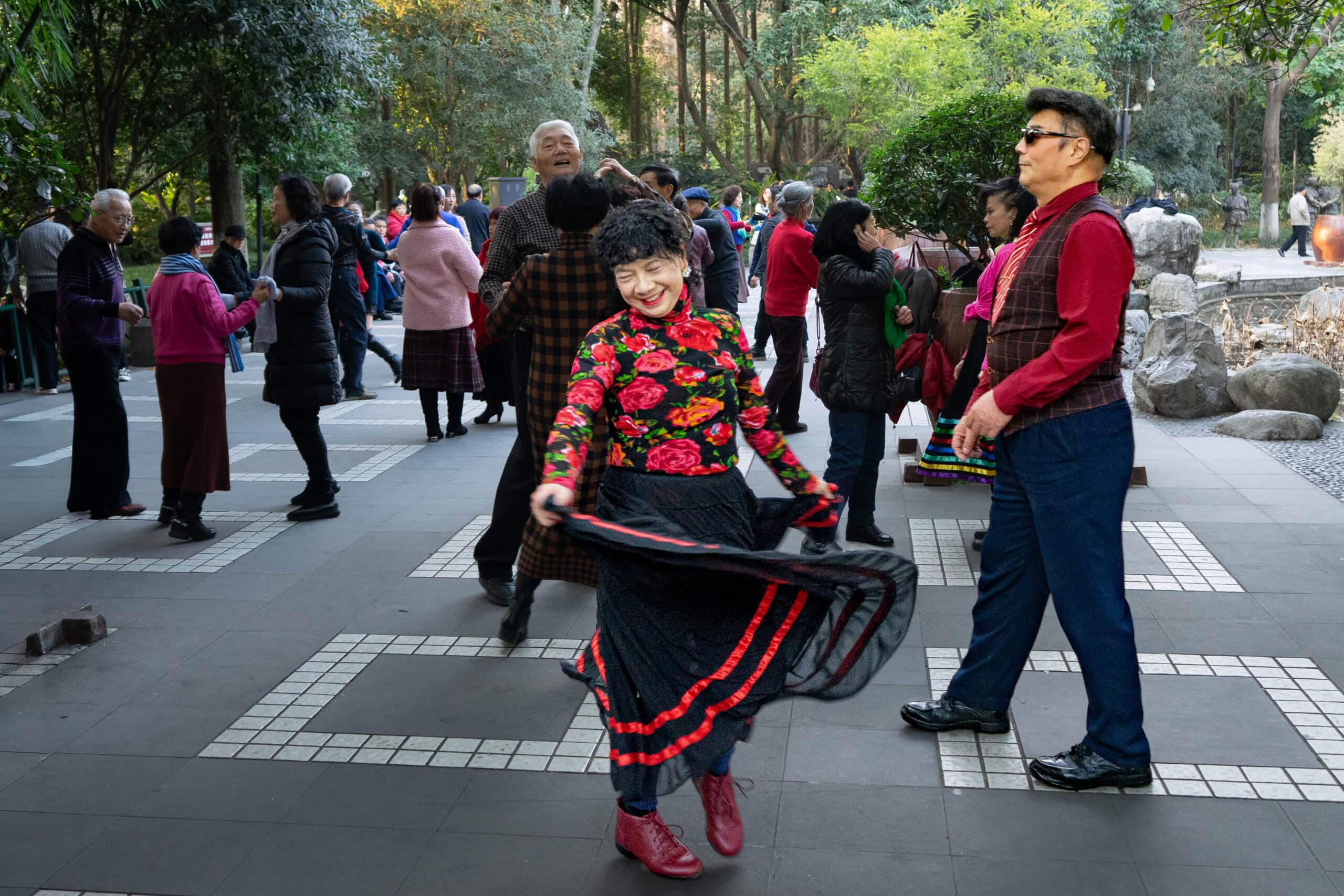 A group of seniors enjoying ballroom dancing in People's Park, Chengdu