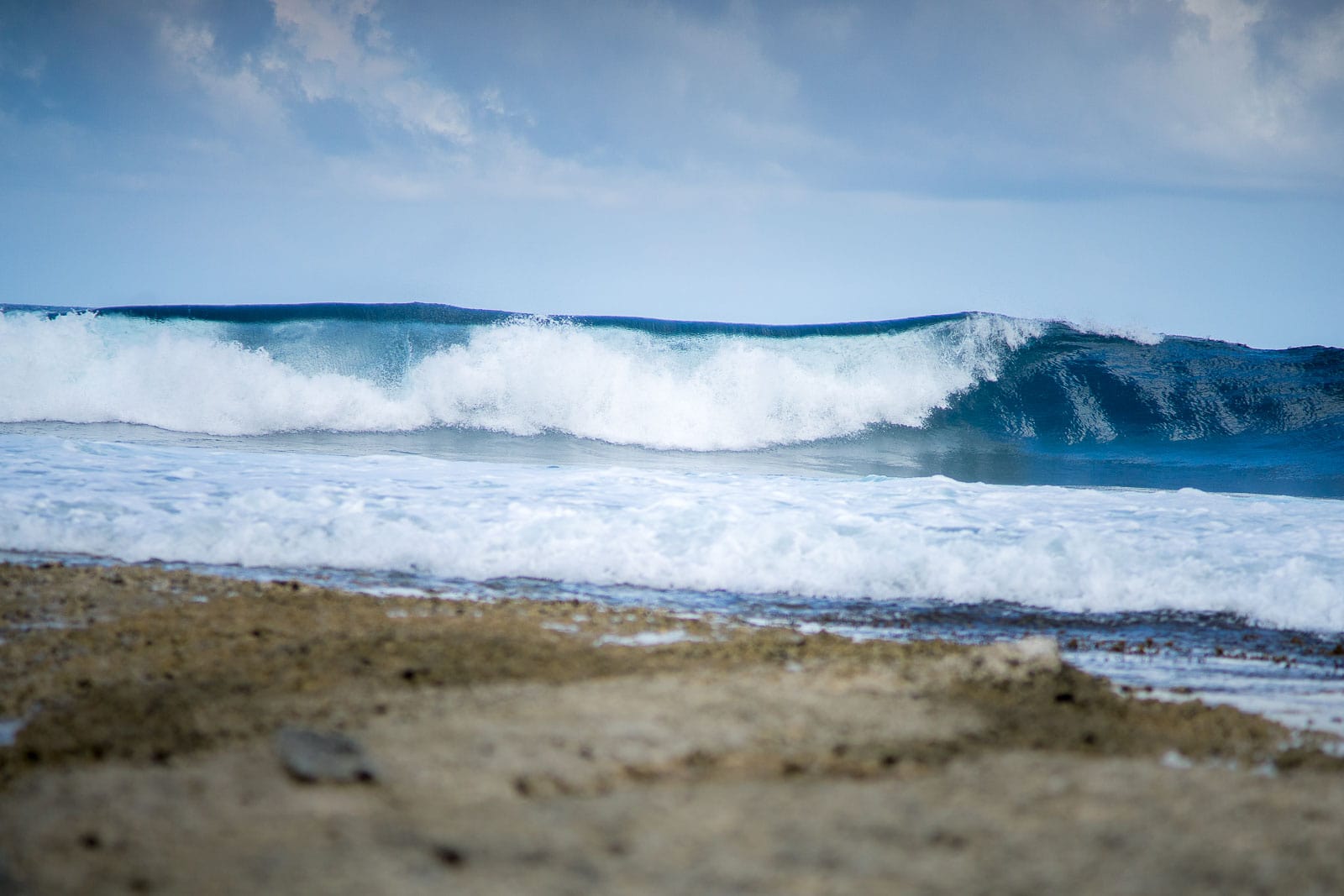 Asu wave in front of Asu Surf camp in February