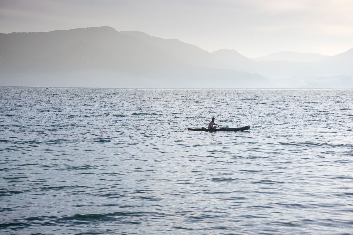 A fisherman fishing with a canoe on Lake Toba, Sumatra