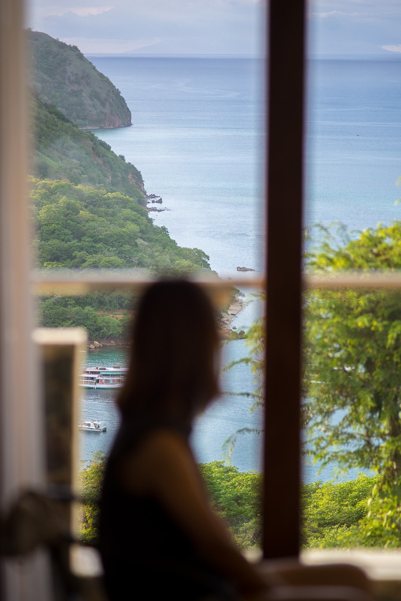 Jin overlooks the sea and islands from our room at La Cecile in Labuan Bajo