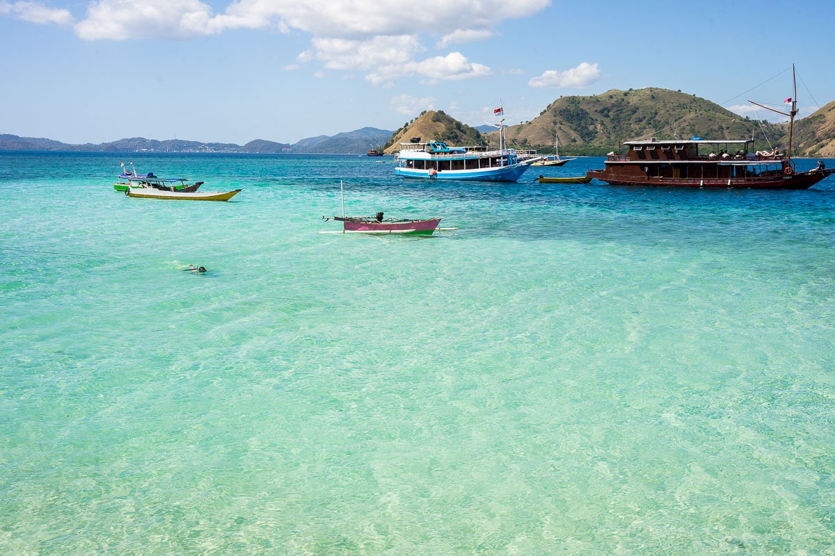 A snorkeler in the shallows at Kelor Island near Labuan Bajo