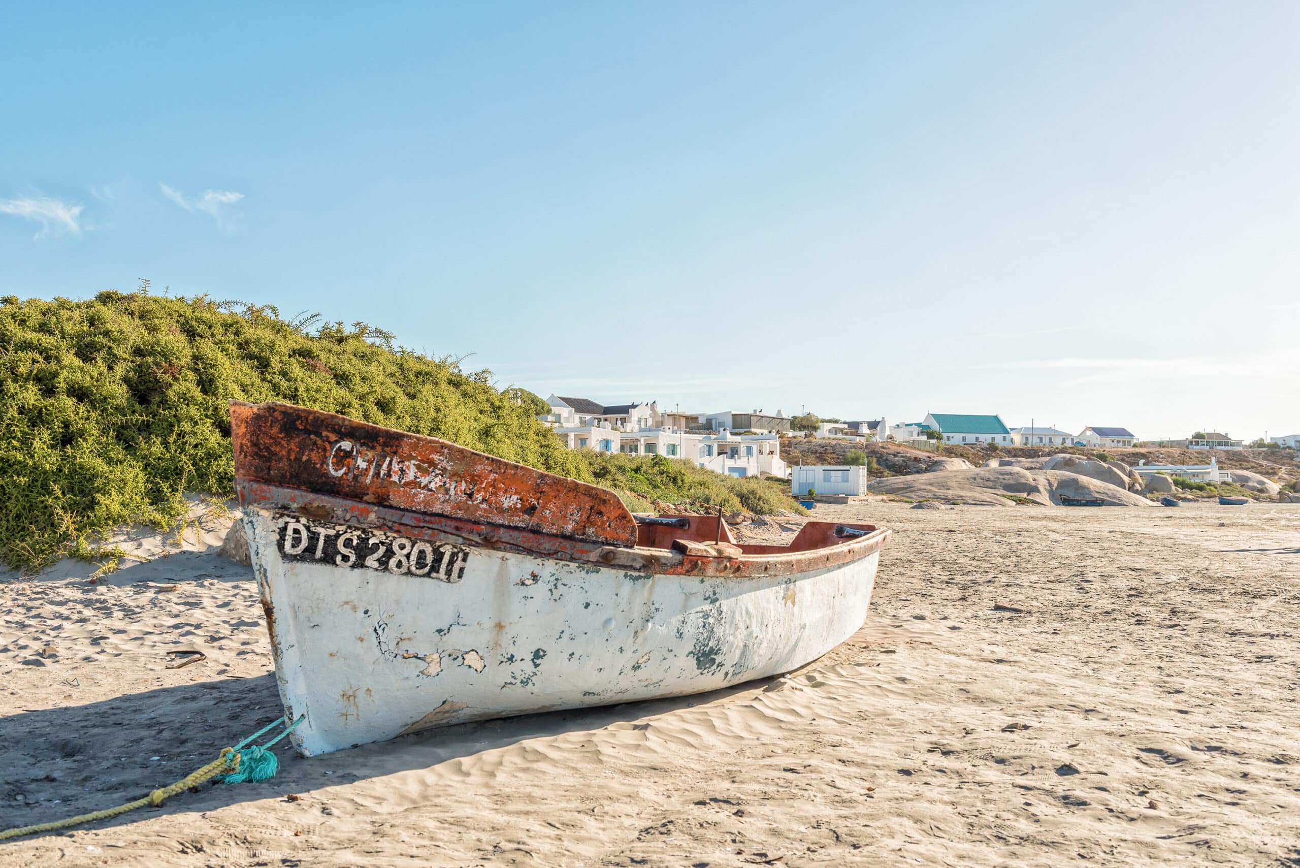 Paternoster Beach with a small fishing boat on it. Paternoster is a popular weekend break from Cape Town and one of the most beautiful small towns in South Africa