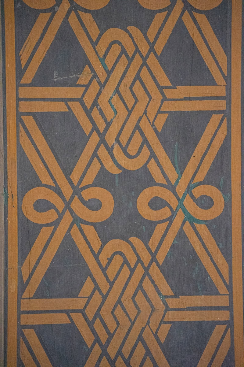 A pattern inside the Jerusalem Synagogue. It looks like woven string in brown on a pale blue background