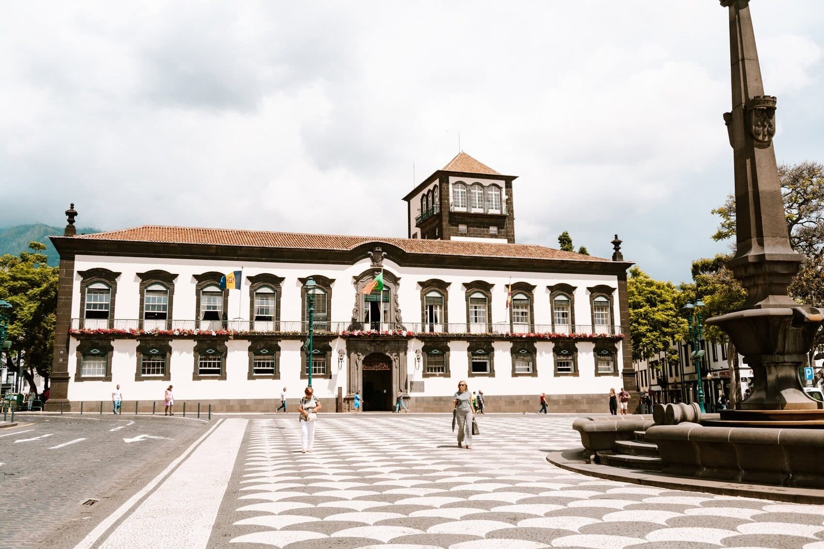 A historic building and a plaza in Funchal, Madeira