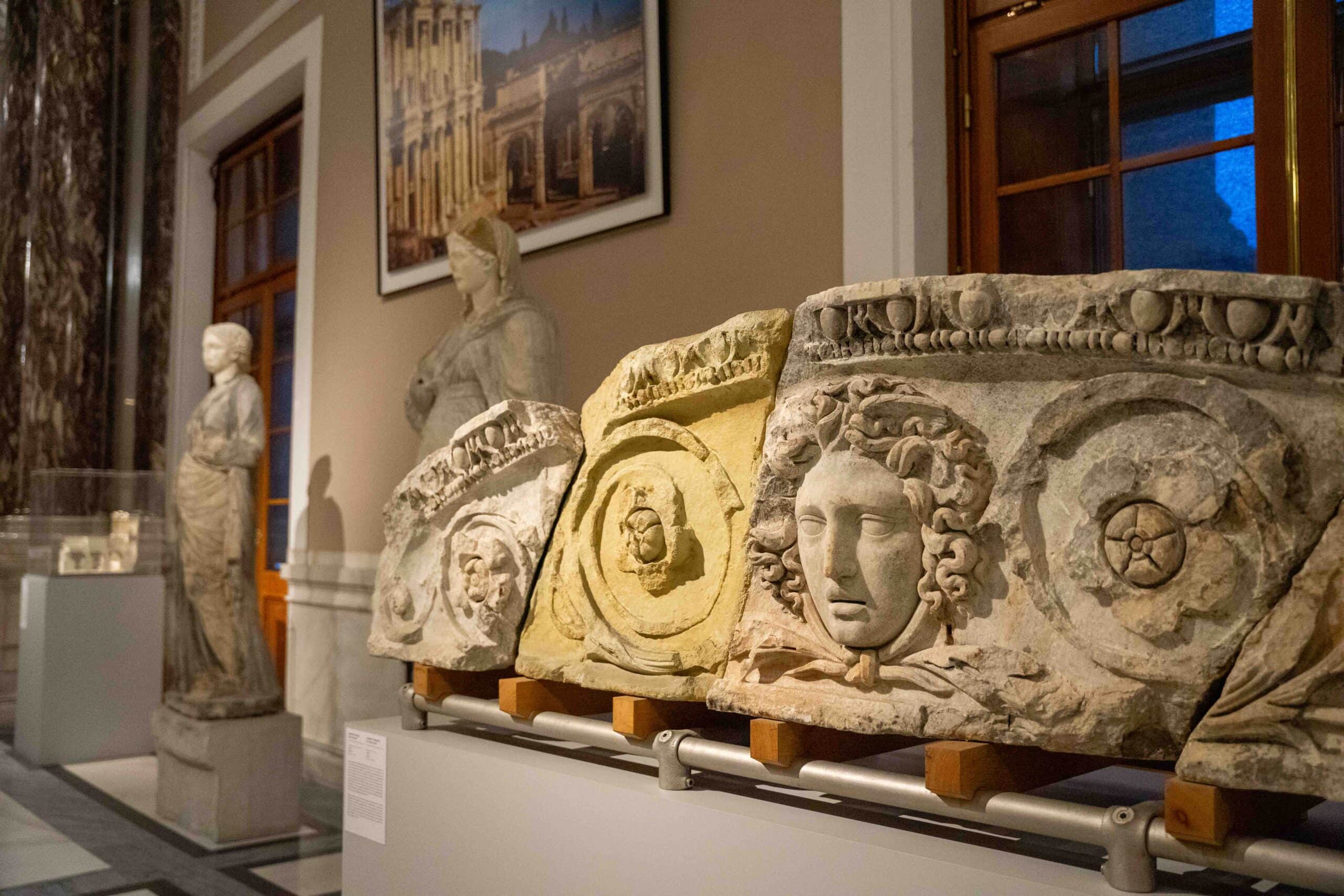 The gable of the Celsus Library with Medusa's head at its centre. You can see two of the Celsus Library Virtues in the background