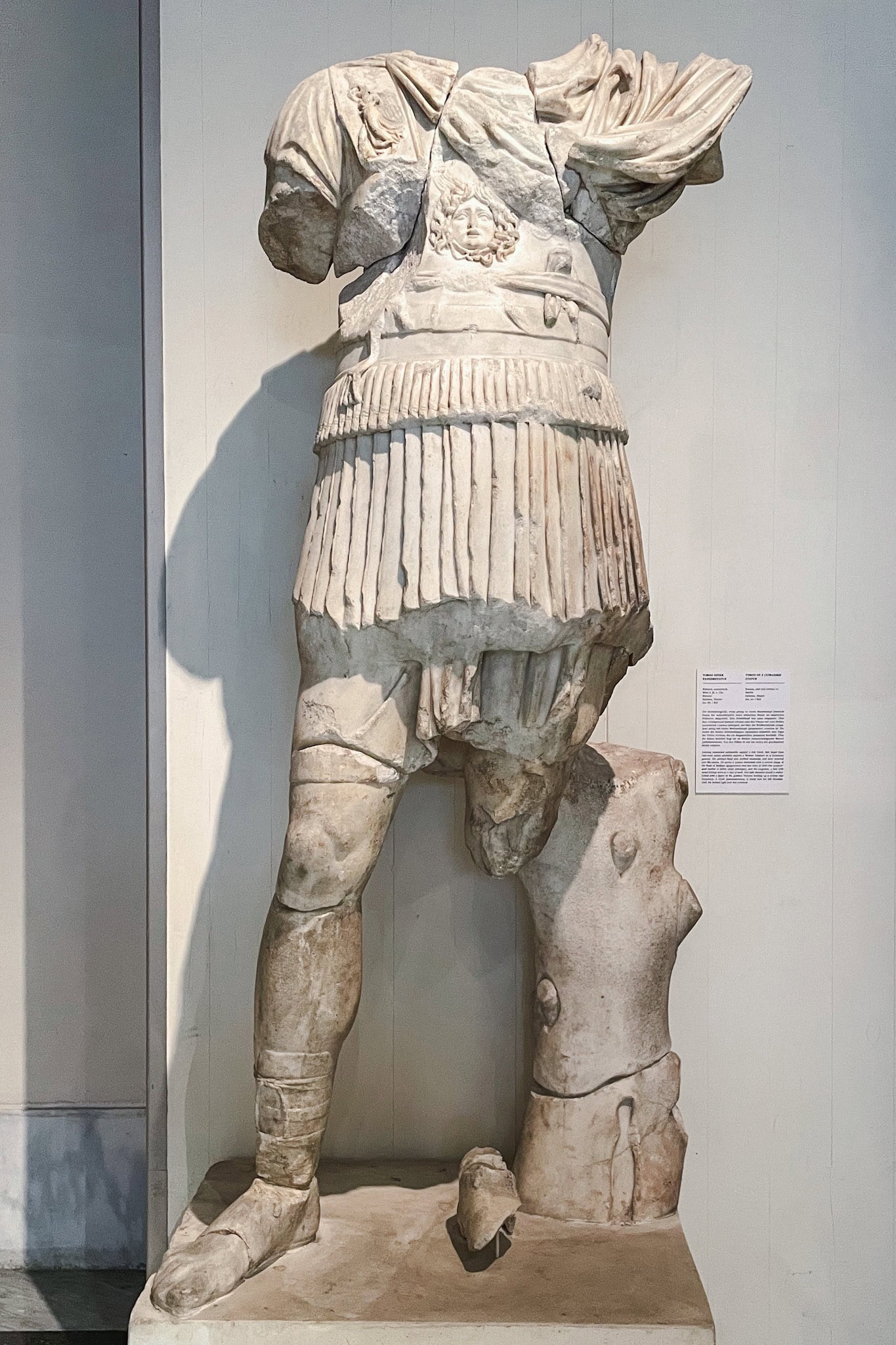 Torso of a Cuirassed Statue is a Roman marble statue of a Roman Emperor. It is larger than life but is missing his head, both arms and one leg