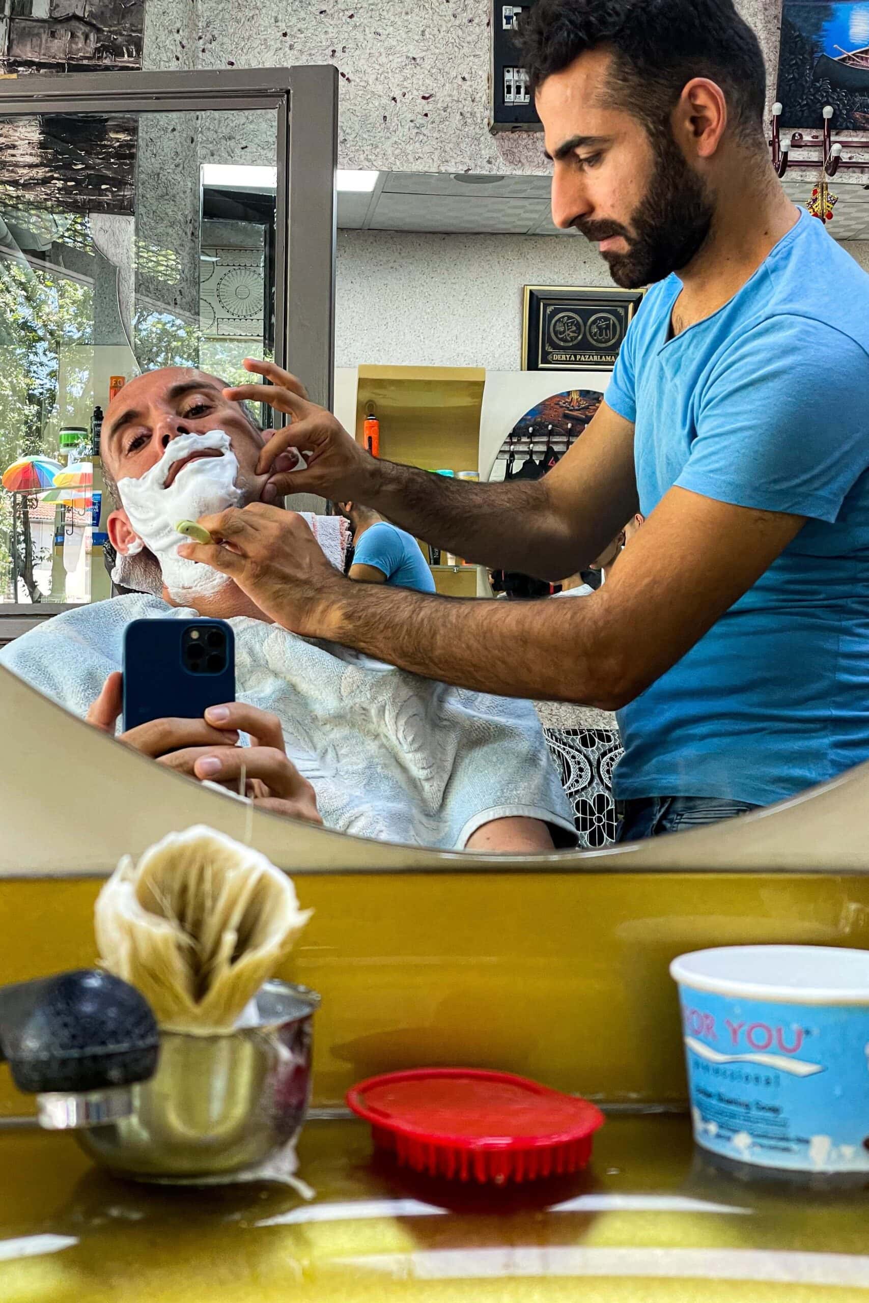 Man getting a Shave at a Turkish barber
