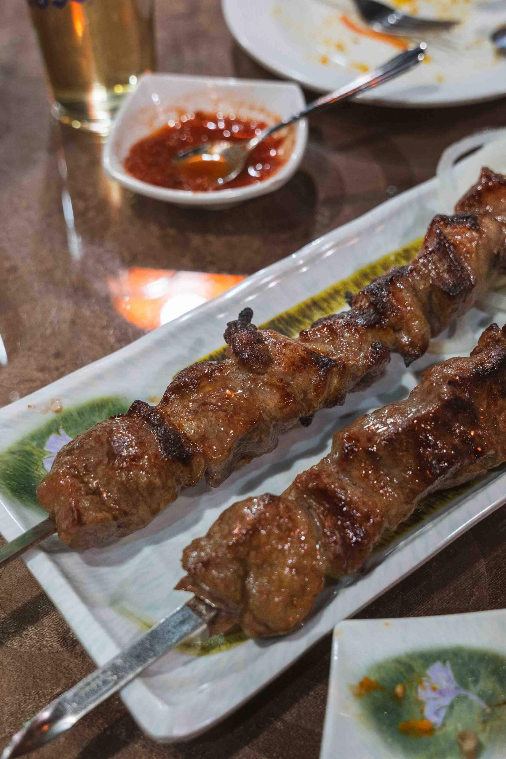 Two shashlik skewers with a small plate of hot sauce that we had at Fortune Restaurant, an excellent Uzbek restuarant in Dongdaemun