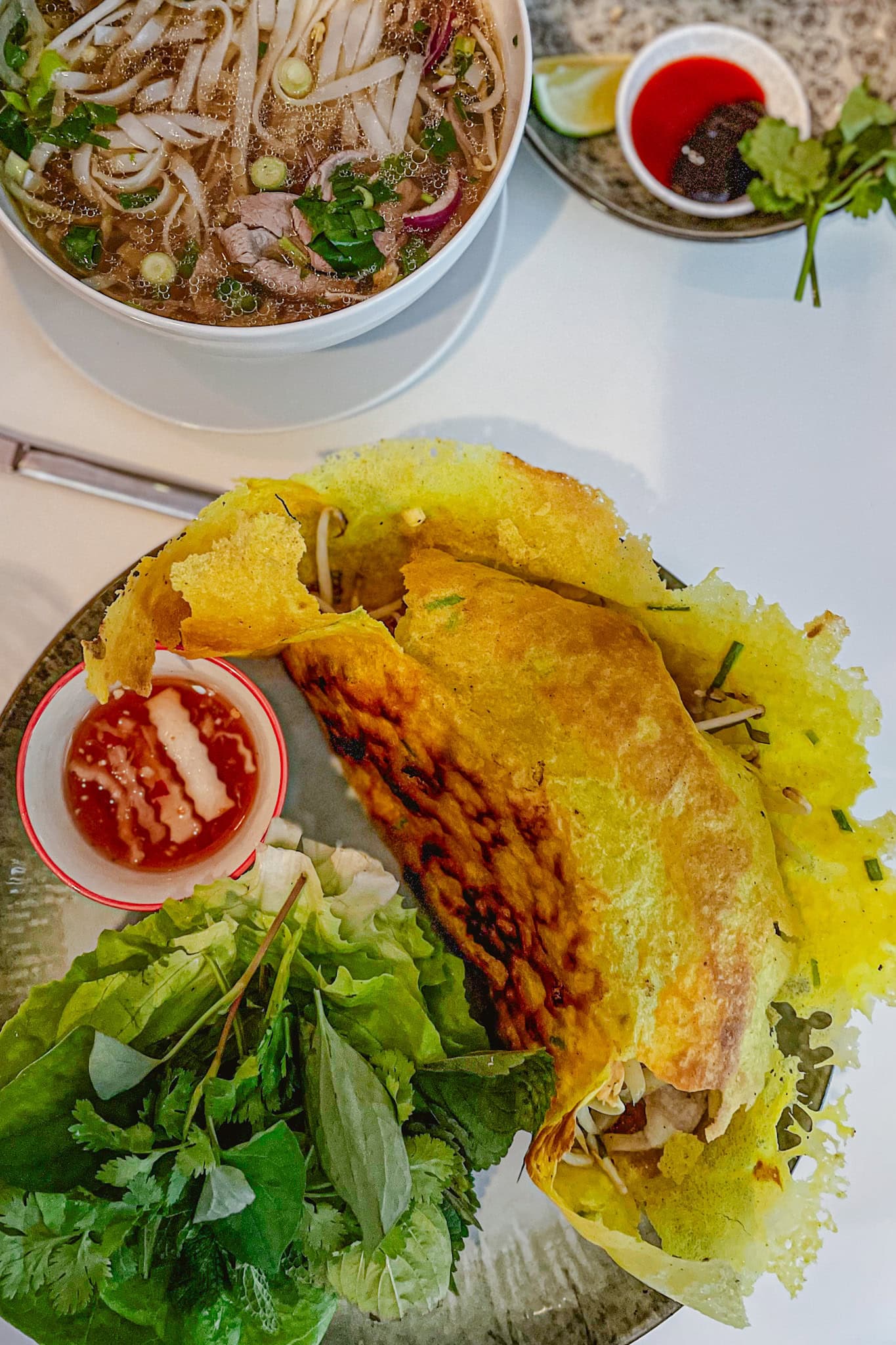 bánh xèo and a bowl of pho we had at Banh Mi Hoi An in Vienna