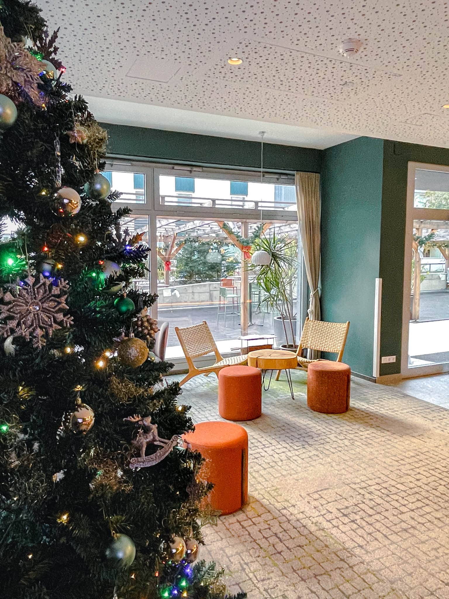 A Christmas tree and lounge area of the Weekend Hotel in Vienna where we stayed for four nights in December