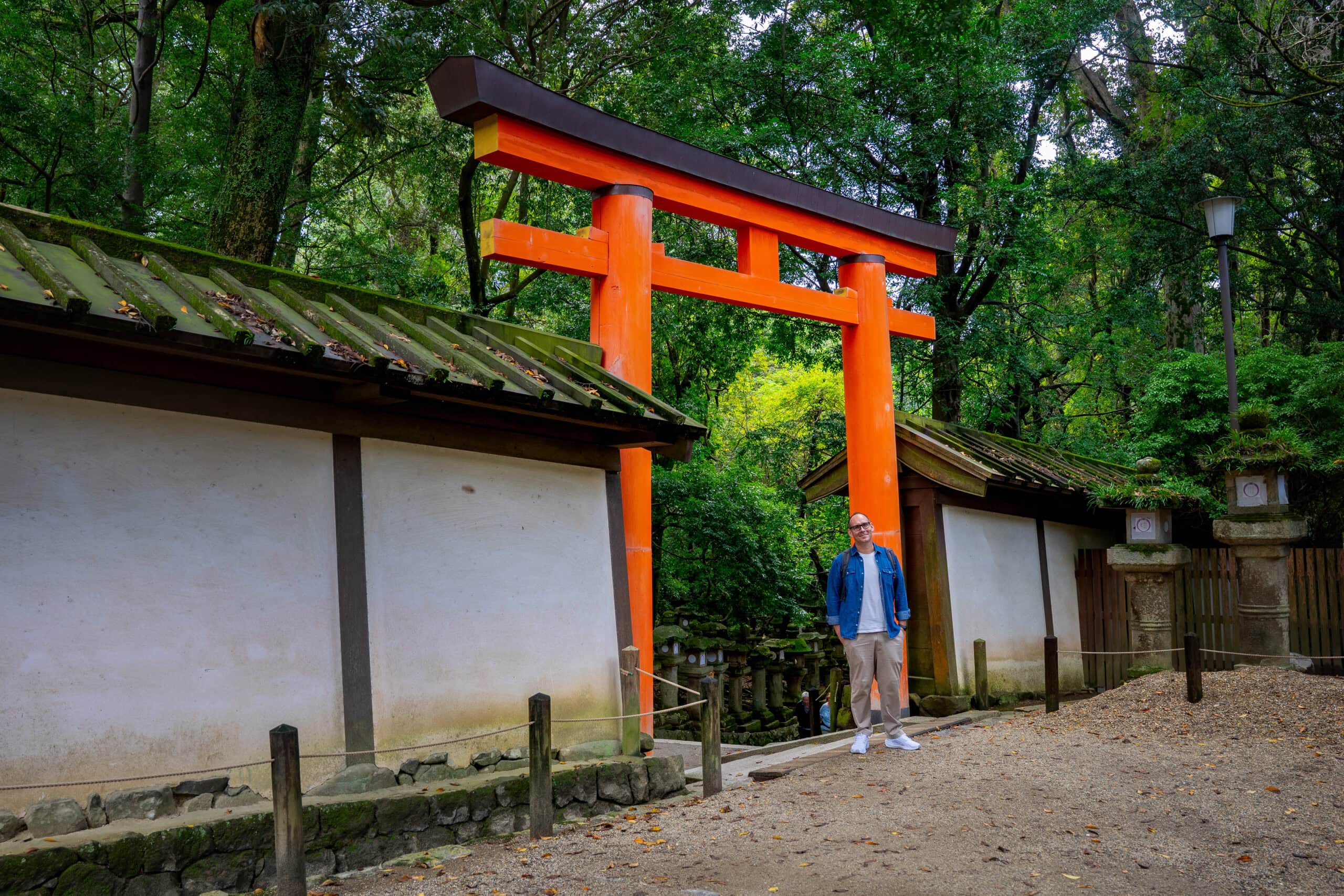 A photo of myself standing in front of a red torii gate at the Kasuga Taisha Shrine