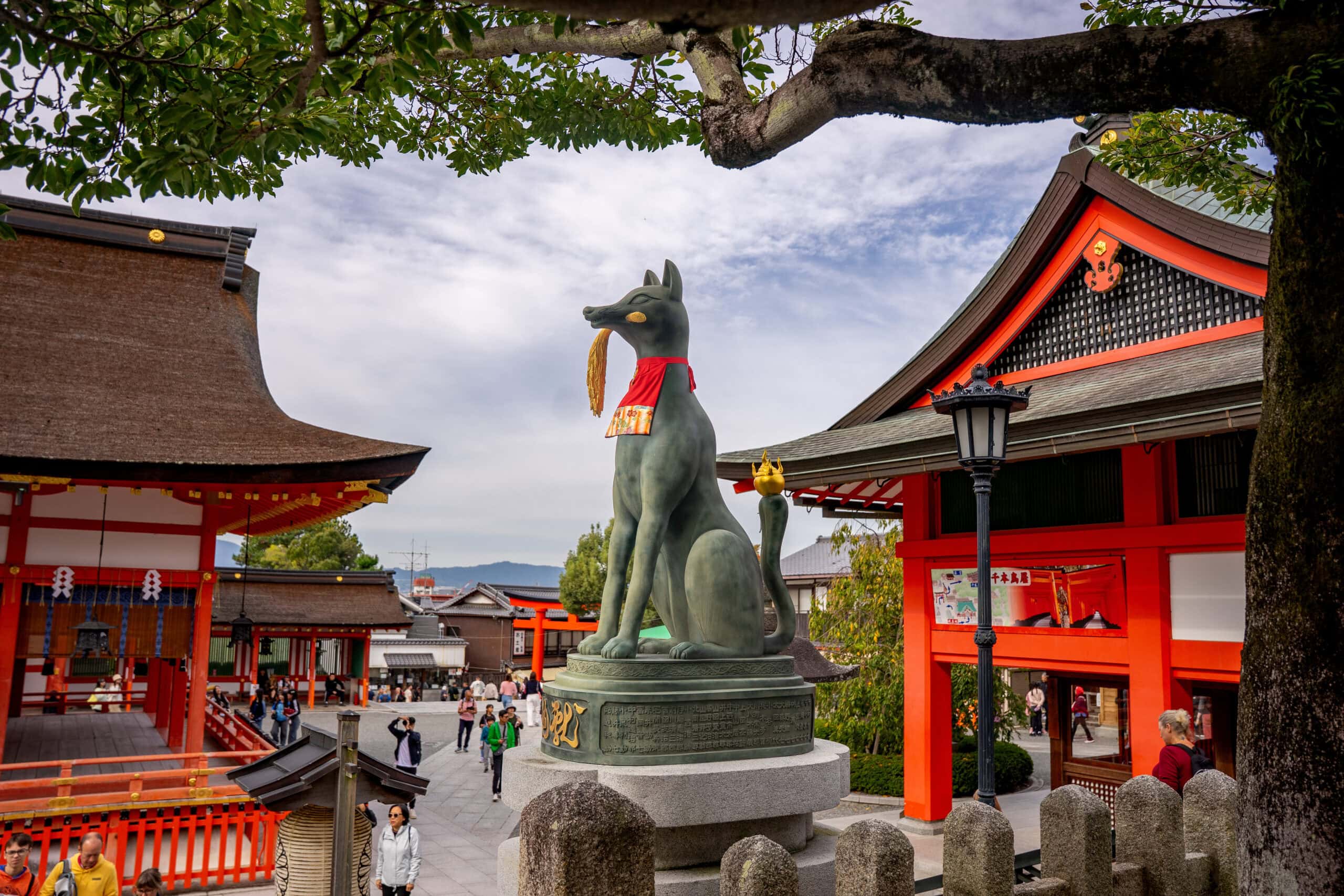 a statue of a fox at Fushimi Inari Taisha near Kyoto