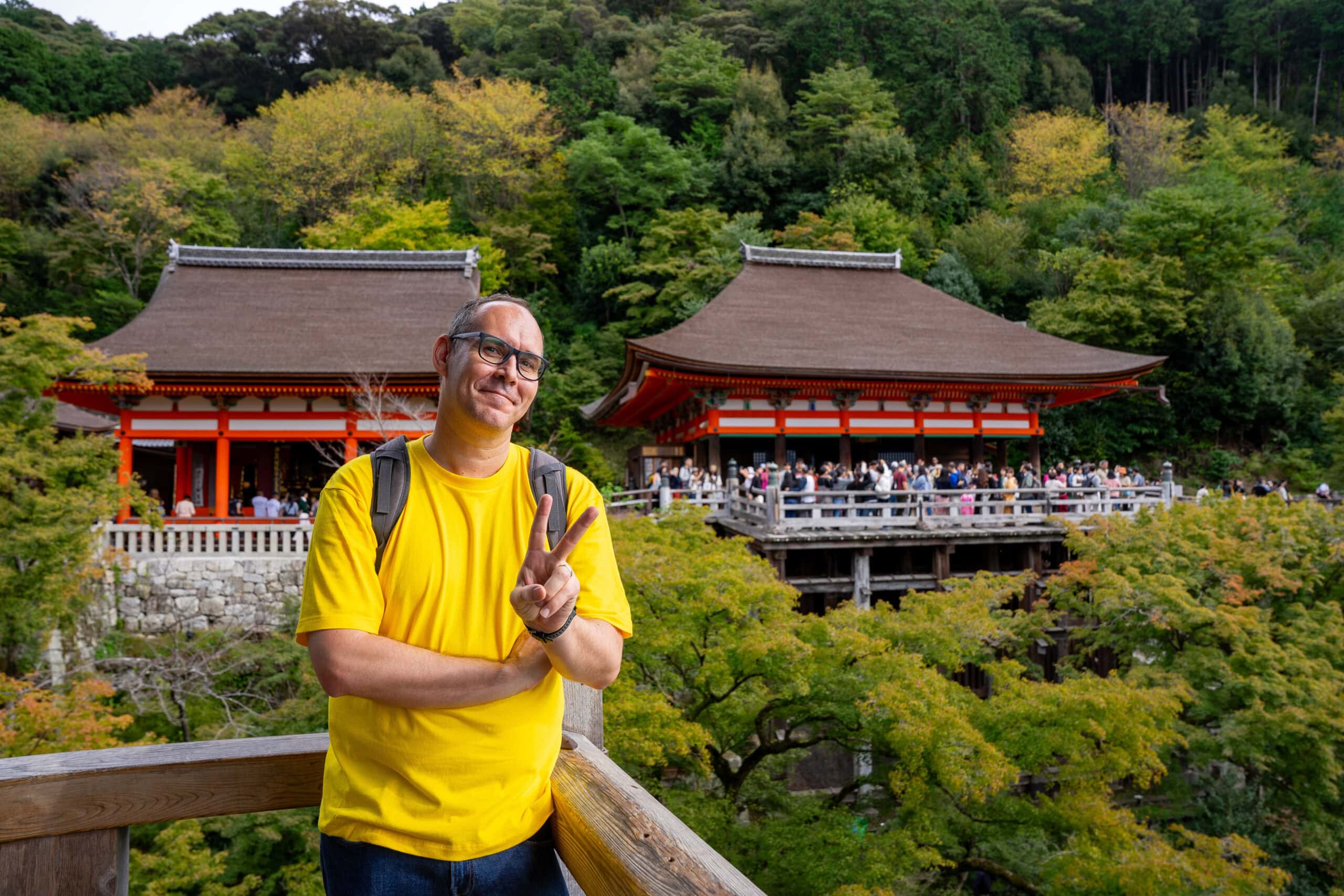 I am posing with the peace sign at Kiyomizu-dera Temple