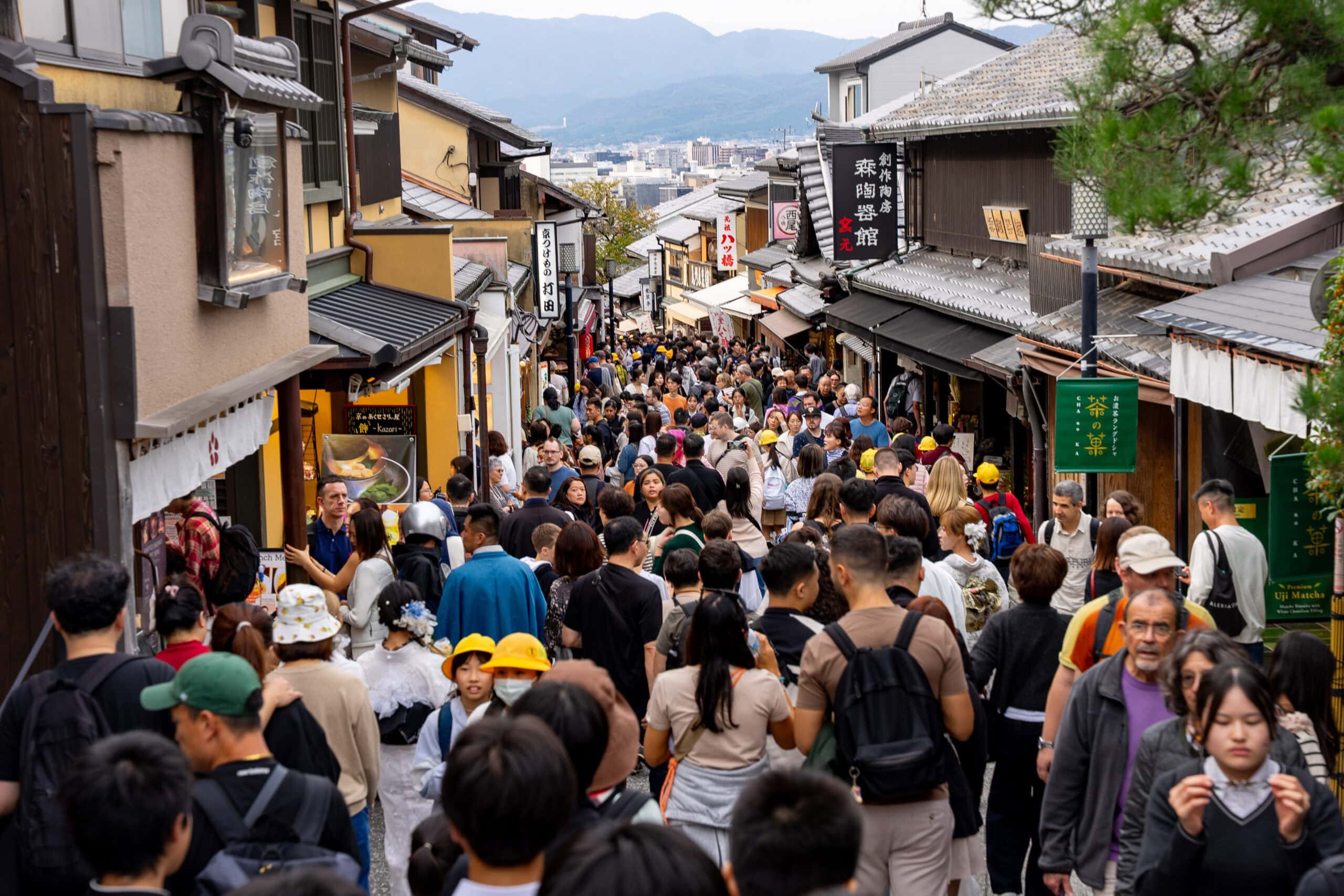 Hordes of tourists in Kyoto. The city suffers from severe over tourism