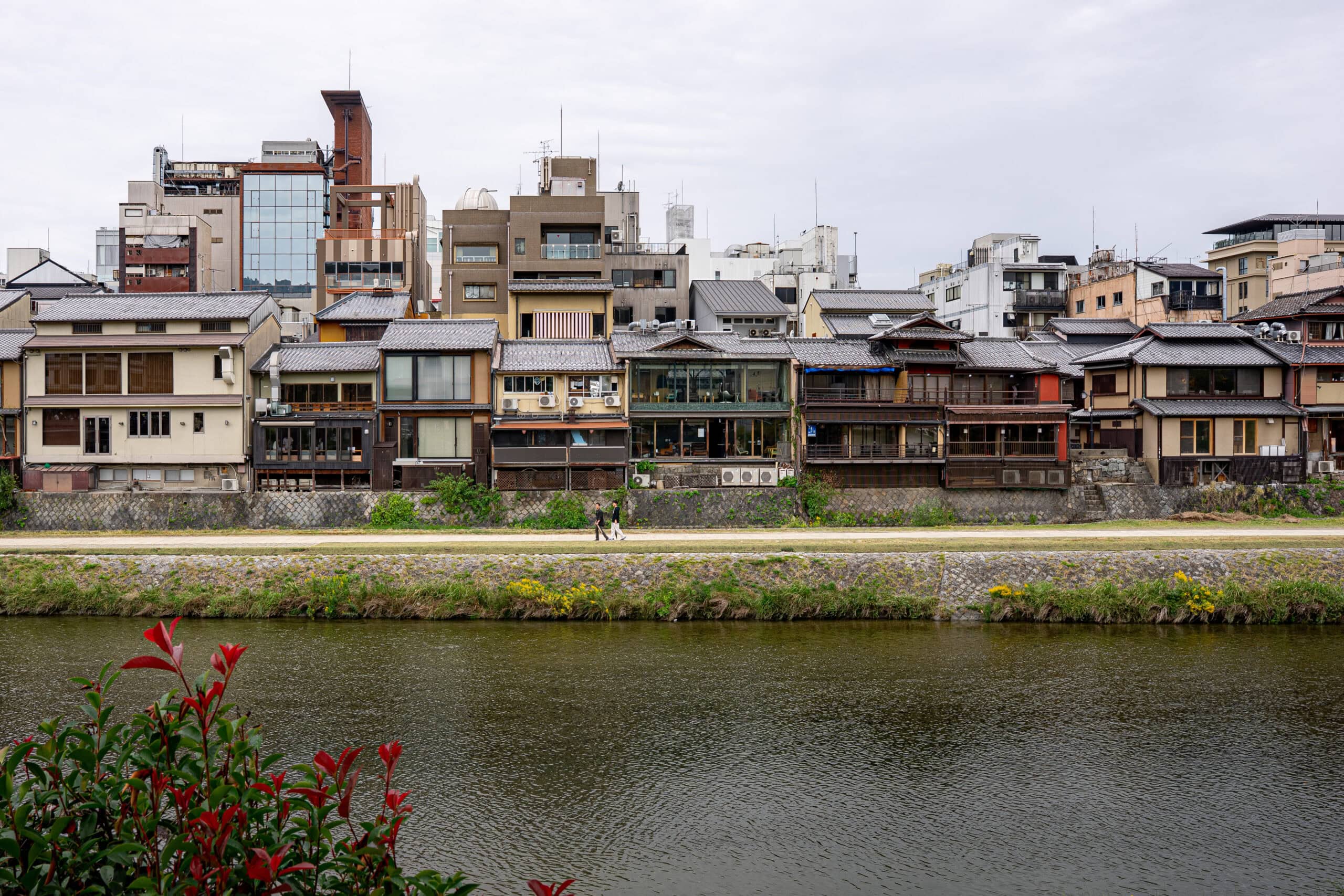 Kamo River with wooden buildings, Kyoto
