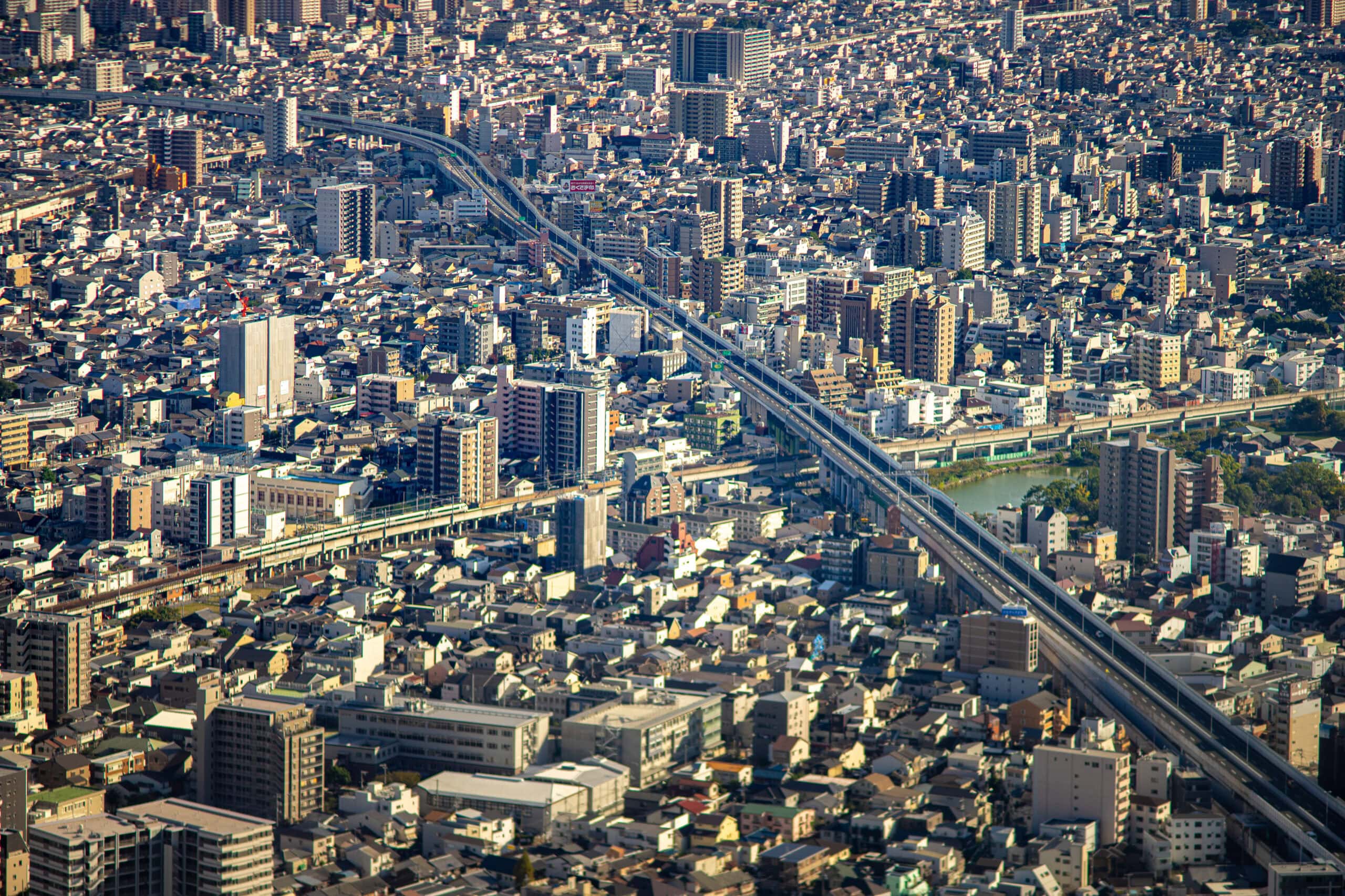 The view from Harukas 300 Observatory in Osaka. You can see a train line running between endless buildings