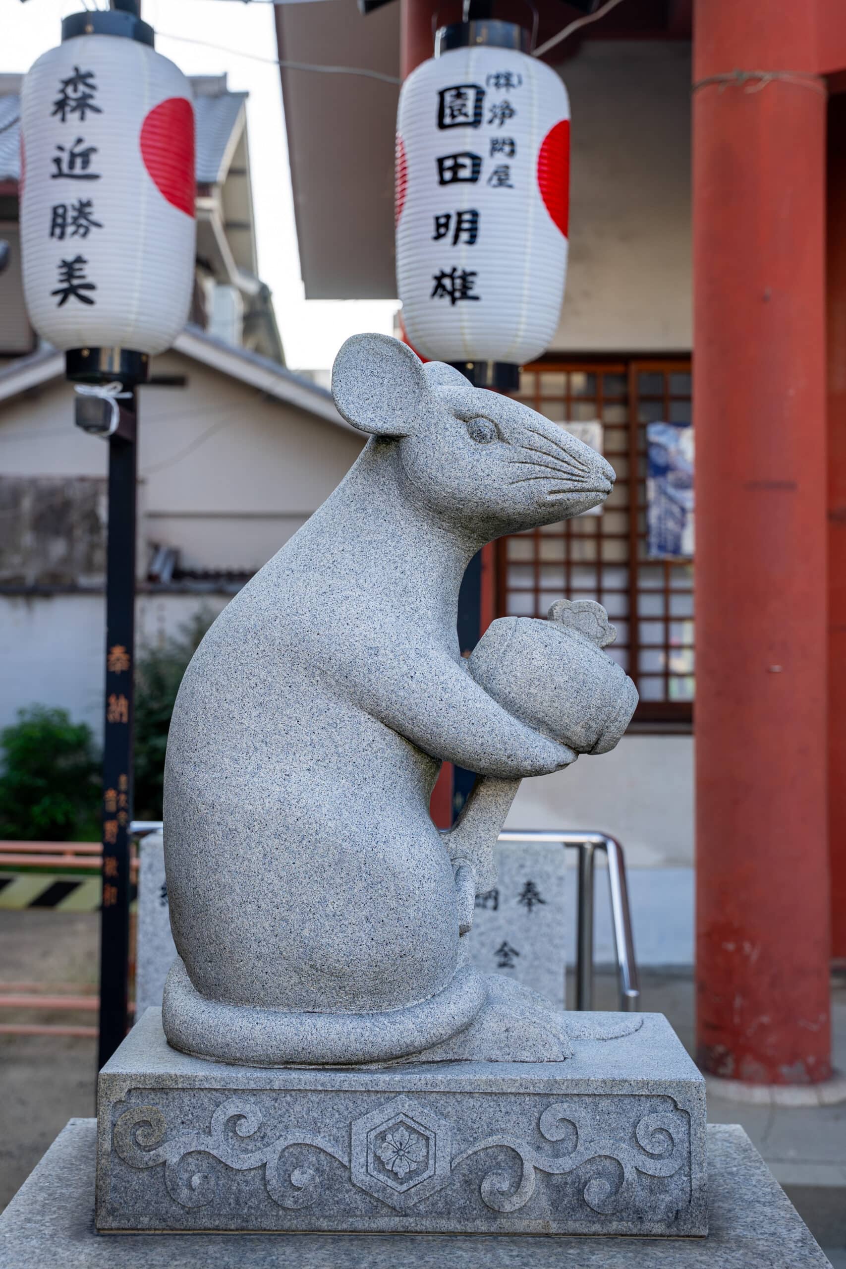 A statue of a mouse at a shrine in Osaka