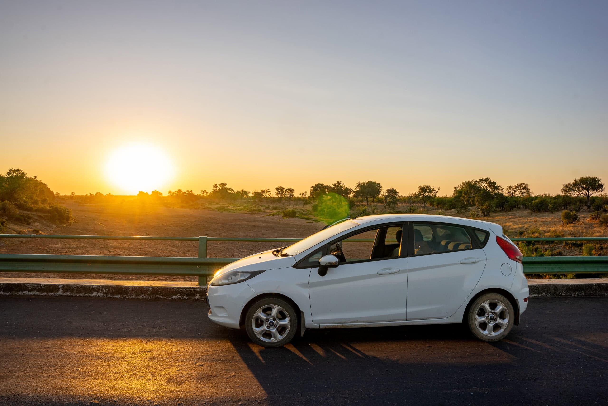 My white Ford Fiesta on the bridge over the Shingwedzi River, Northern Kruger Park, South Africa
