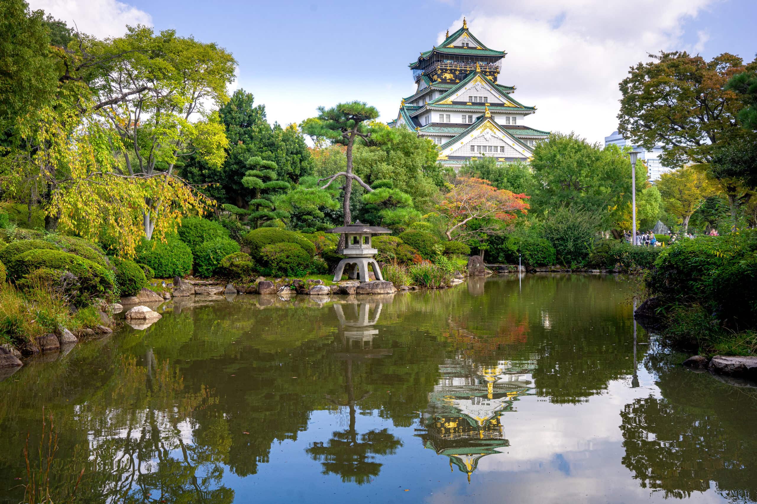 Osaka castle refletected in a pond
