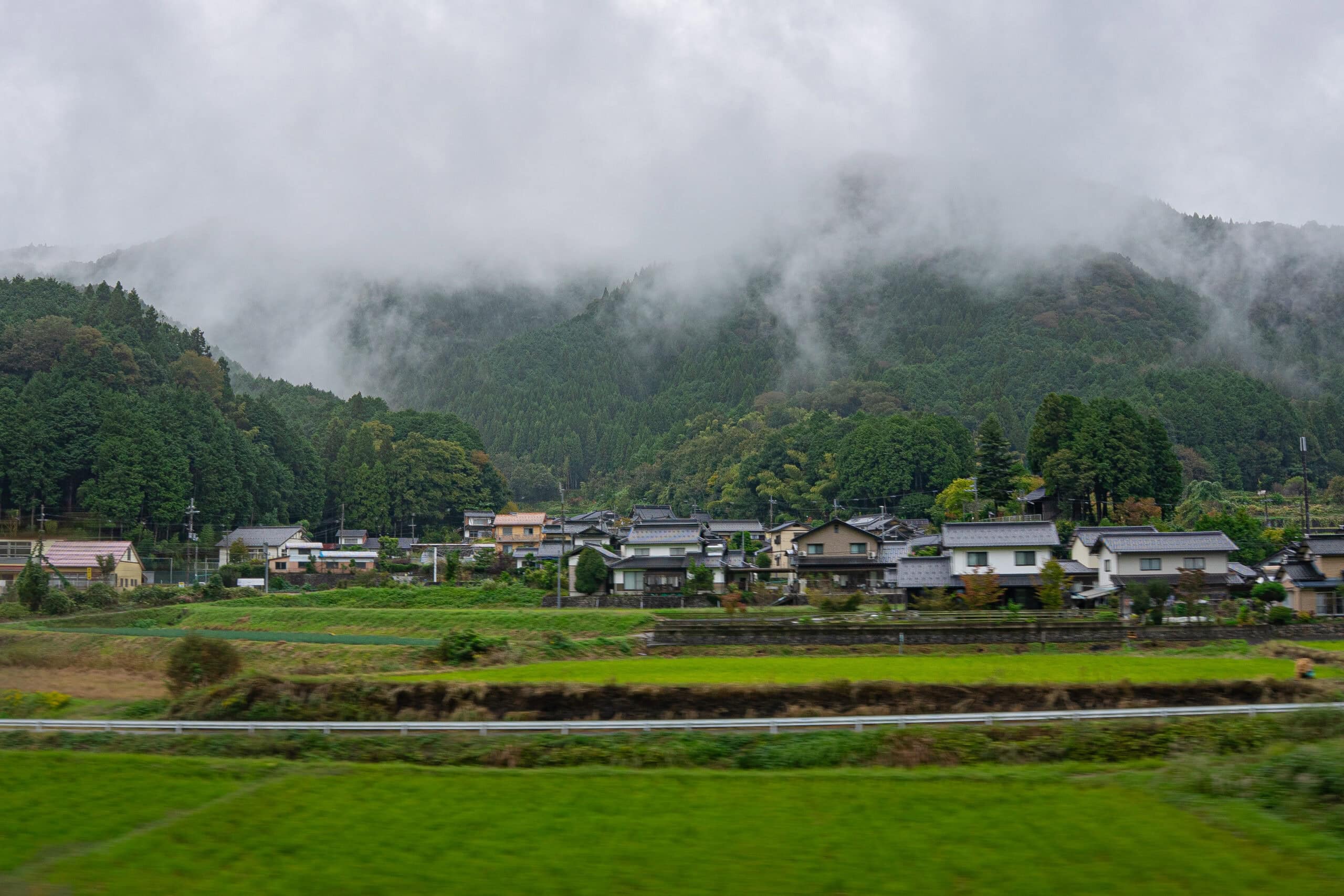 Rural scenery of Japan, seen from a train window between Osaka and Kinosaki Onsen