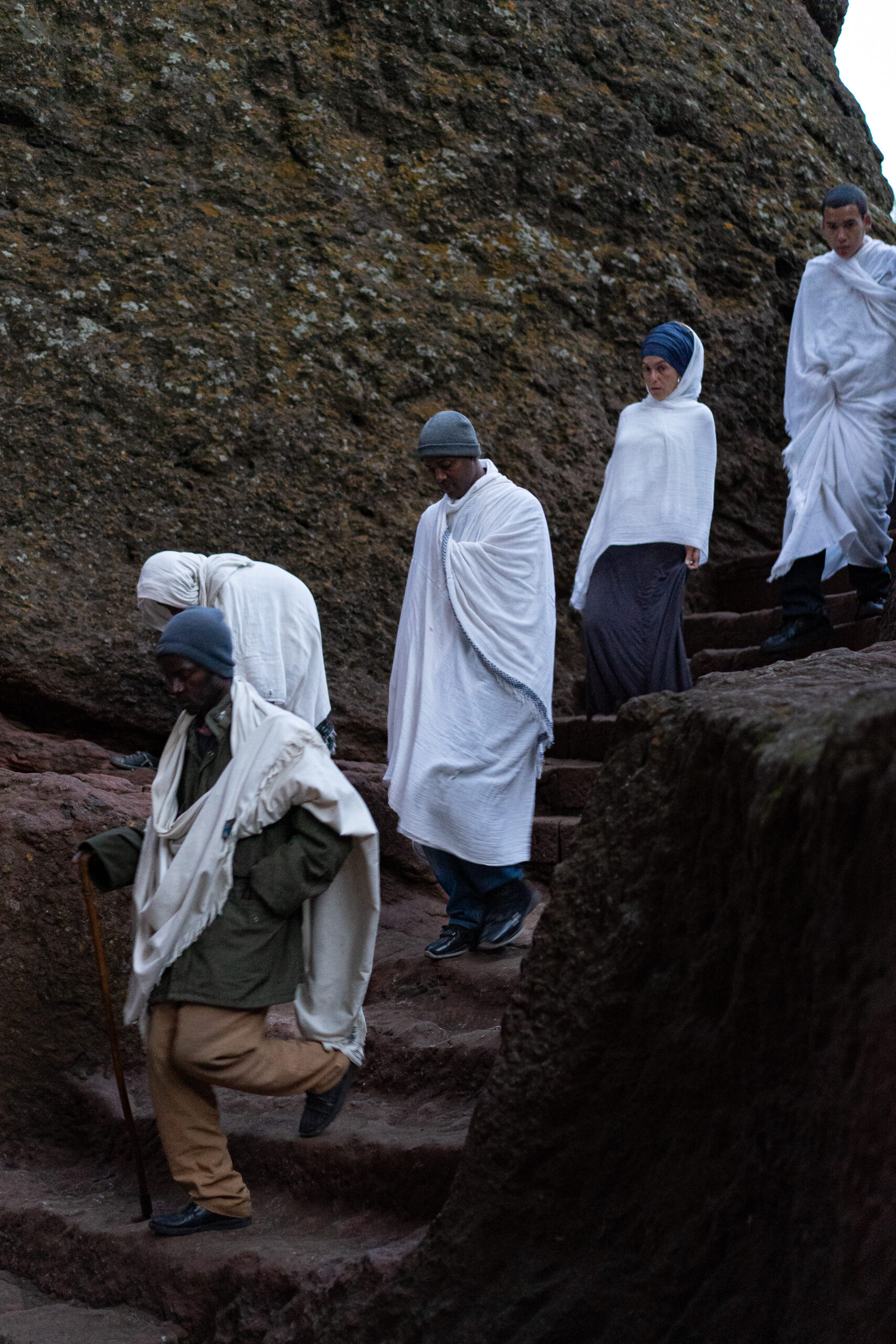 A group of church goers arrive at Biet Medhane Alem, dressed in white shawls