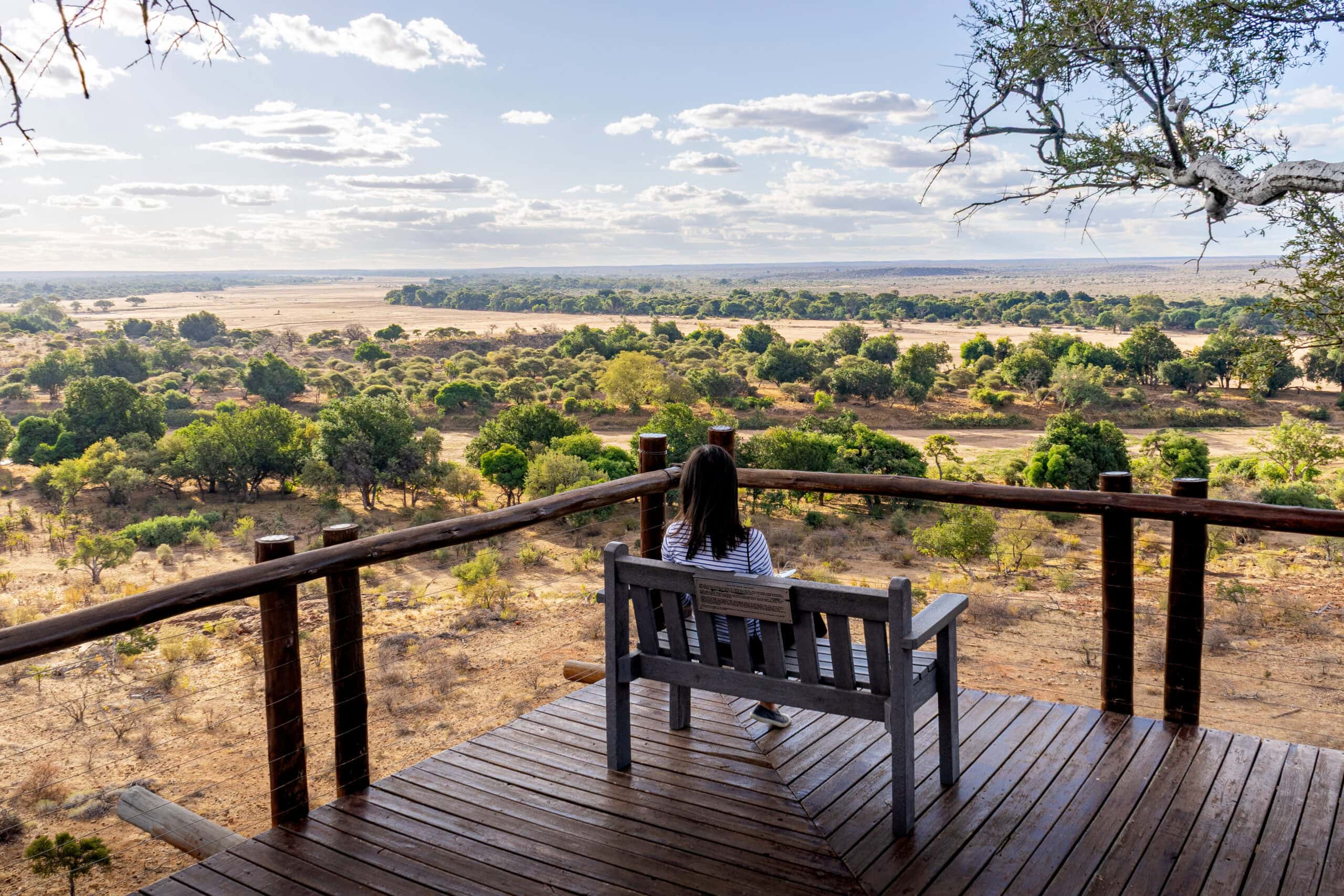 Jin peers into Botswana and Zimbabwe from the Confluence View Deck in Mapungubwe