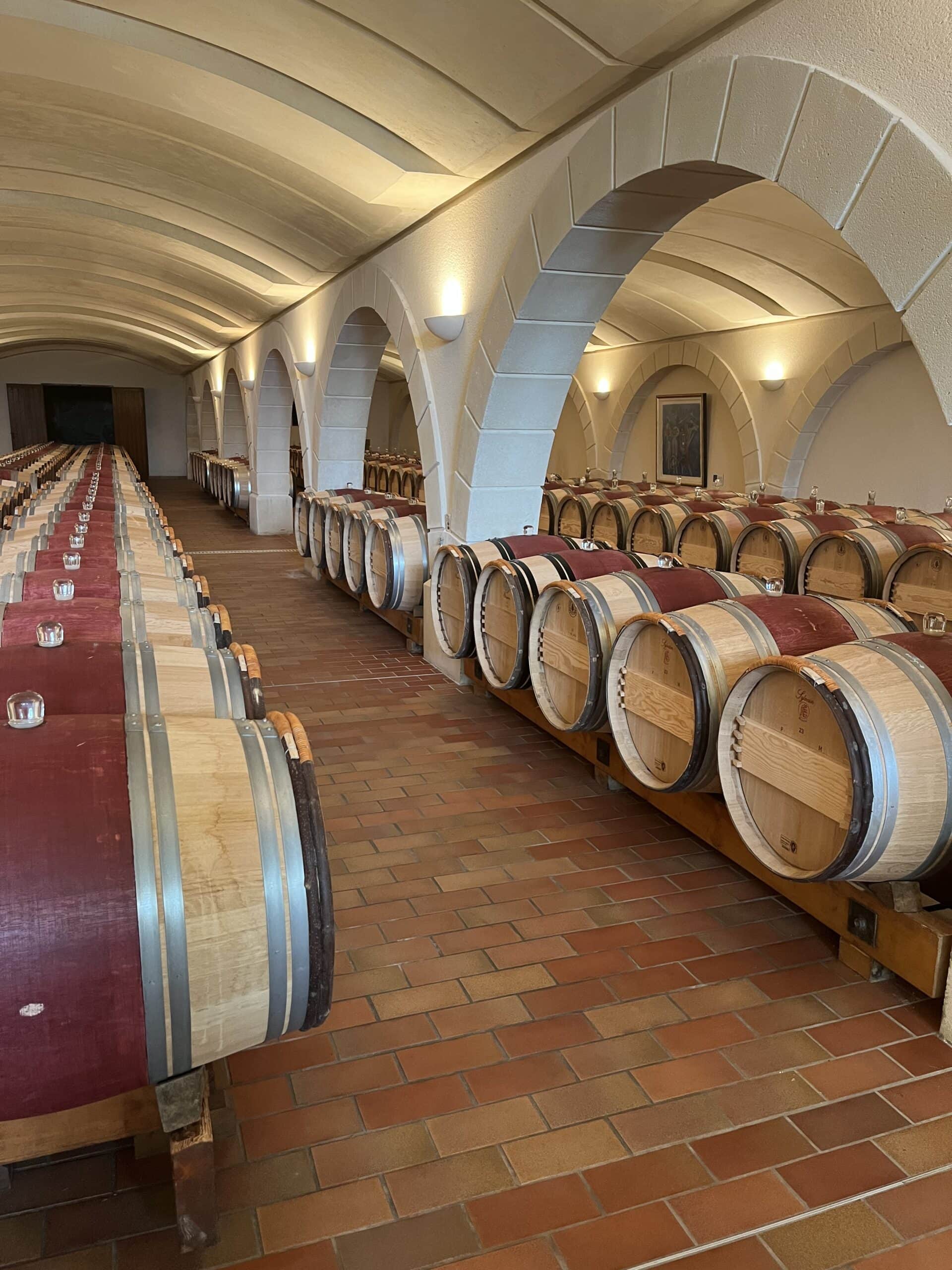 A wine cellar full of barrels in Bordeaux, France