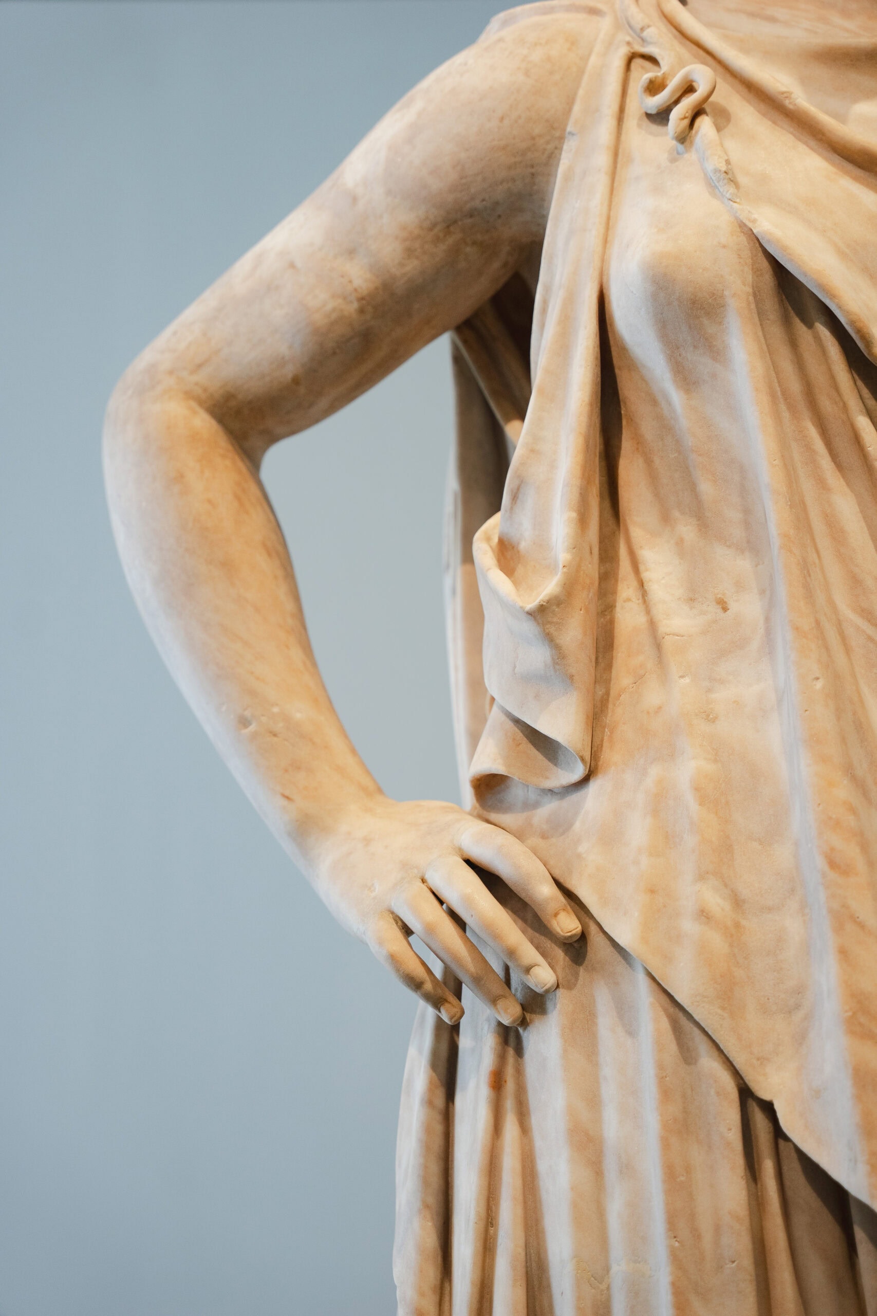 Detail of a marble statue inside the Louvre Abu Dhabi