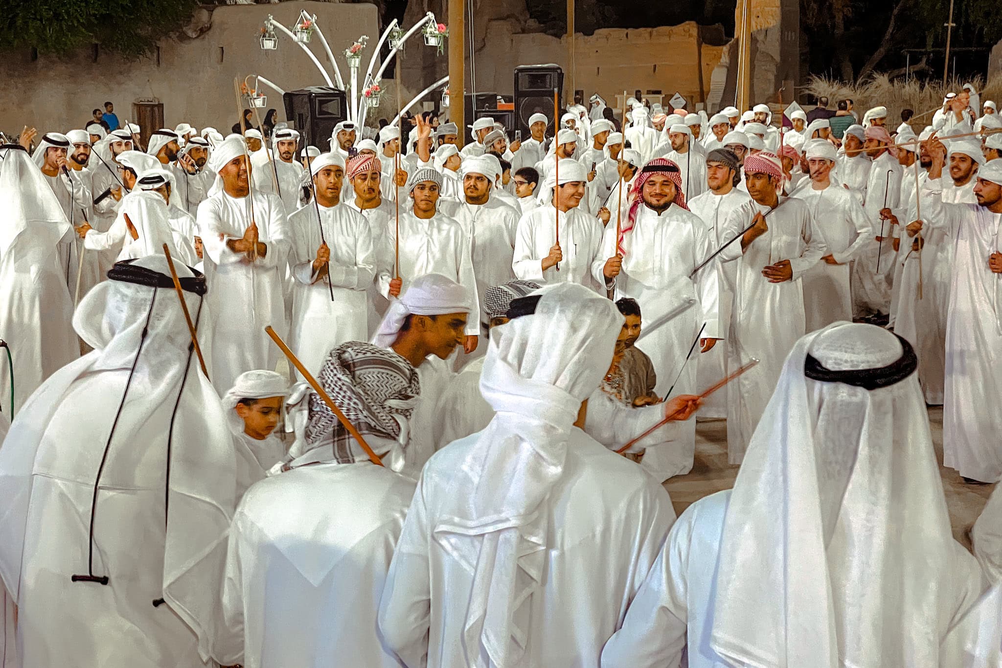 Local Emirari men in traditional costume at a cultural festival in Al Ain. 
