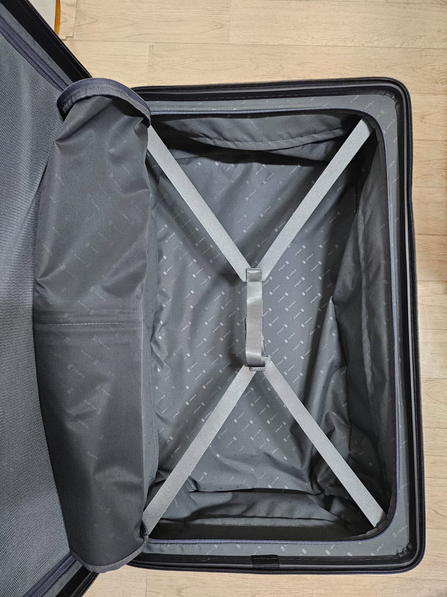 The main compartment of the 26 inch Level8 Voyageur is deep with plenty of packing space and a click-release strap to keep everything compact