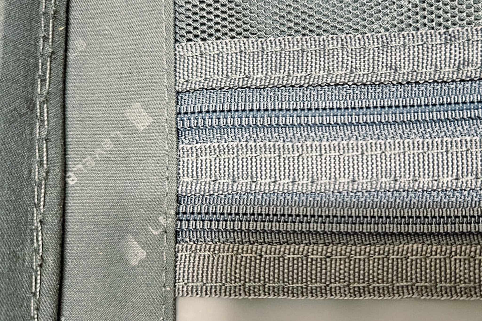 Stitching and fabric of the Level8 Voyageur on the interior of our 26 inch model. A grey colour scheme with consistent and even stitching and durable fabric
