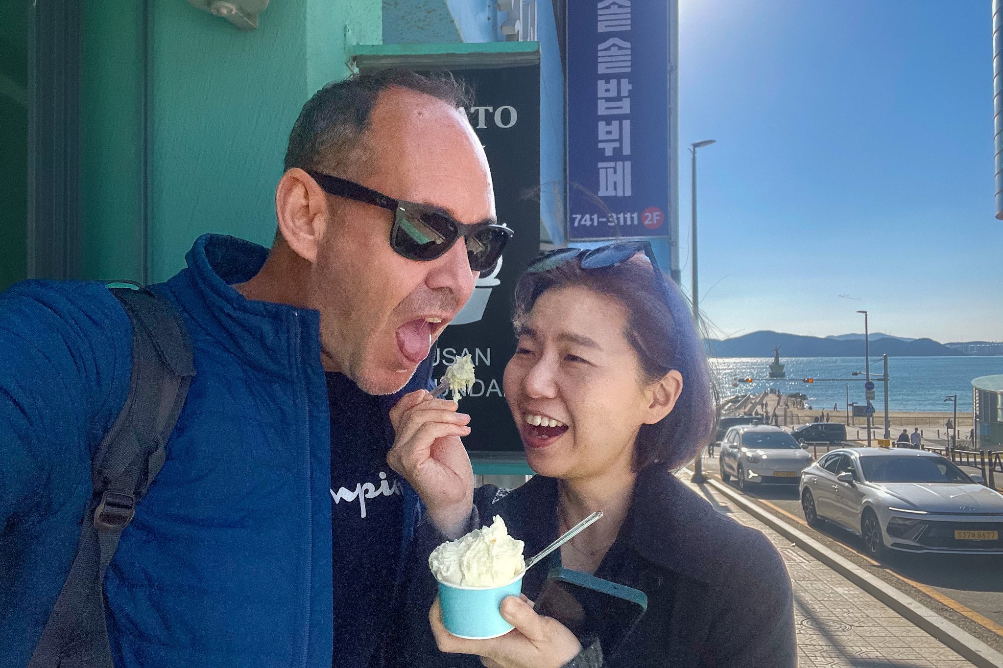 A selfie of Jin feeding me ice cream