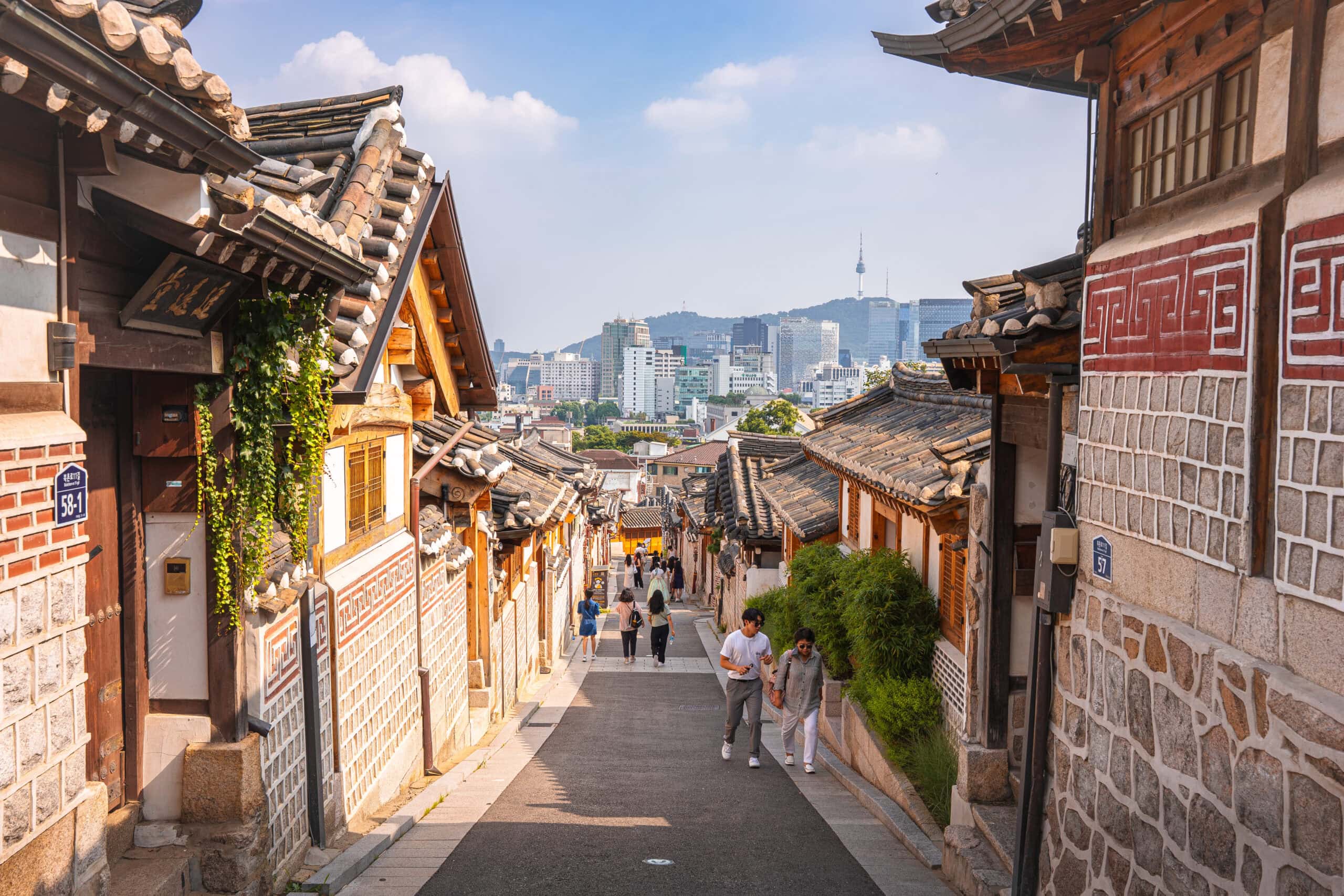Traditional hanok houses in Bukchon Seoul with the Namsan tower in the back ground