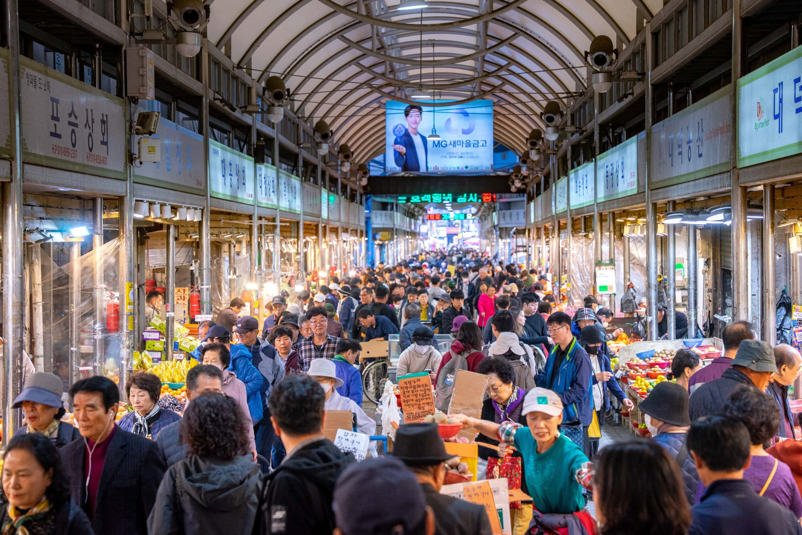 Crowds of people surging through Gyeongdong market in Seoul
